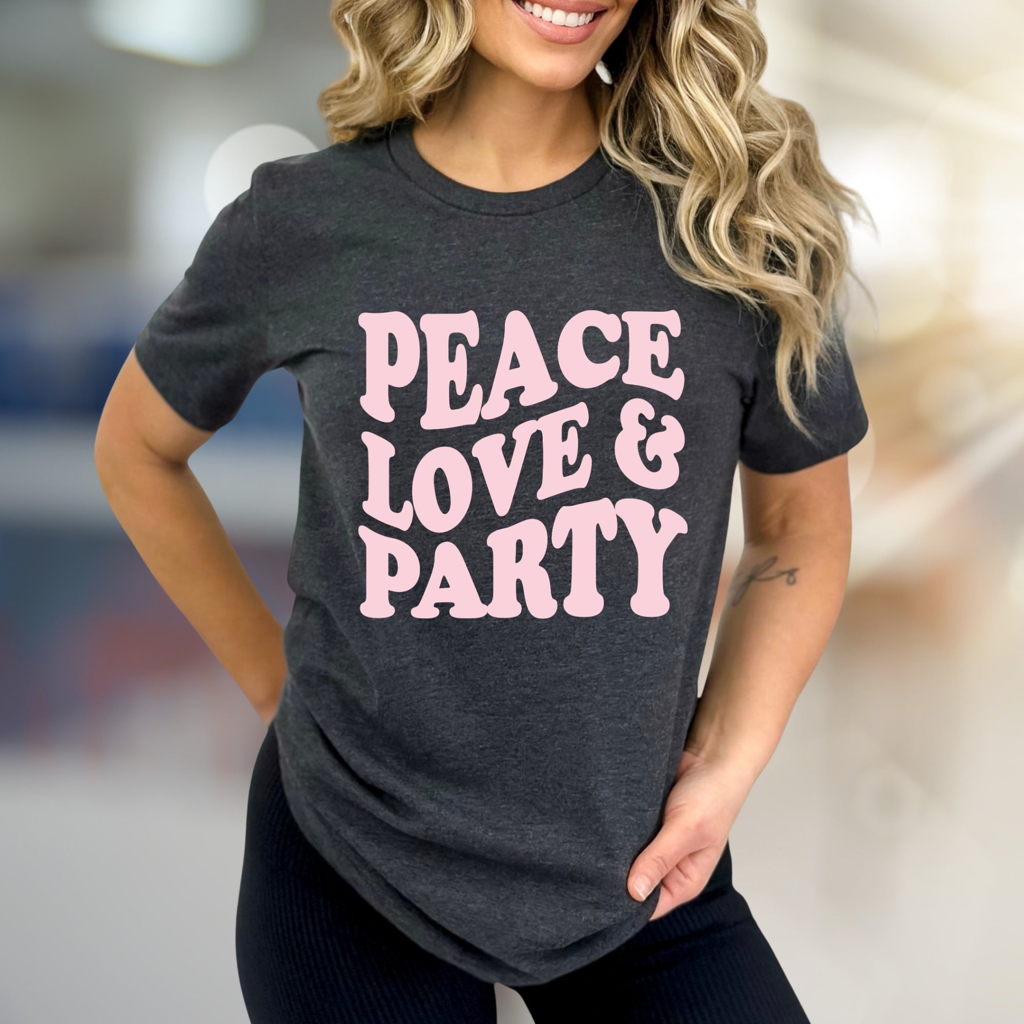 "Peace Love & Party" Groovy Graphic Tee, a Retro-Vibe Pick for Free Spirits