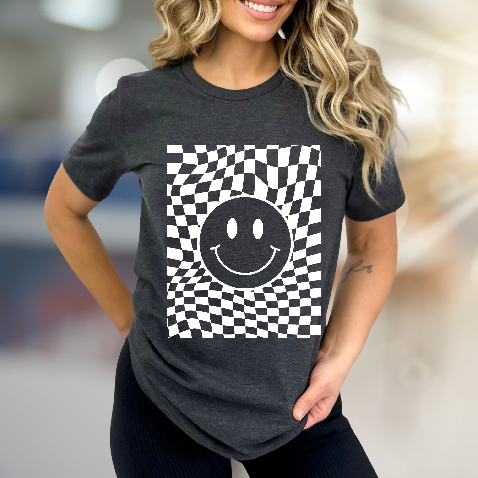 Warped Checkerboard Smiley Graphic Tee, A Retro-Inspired Pick for Free Spirits