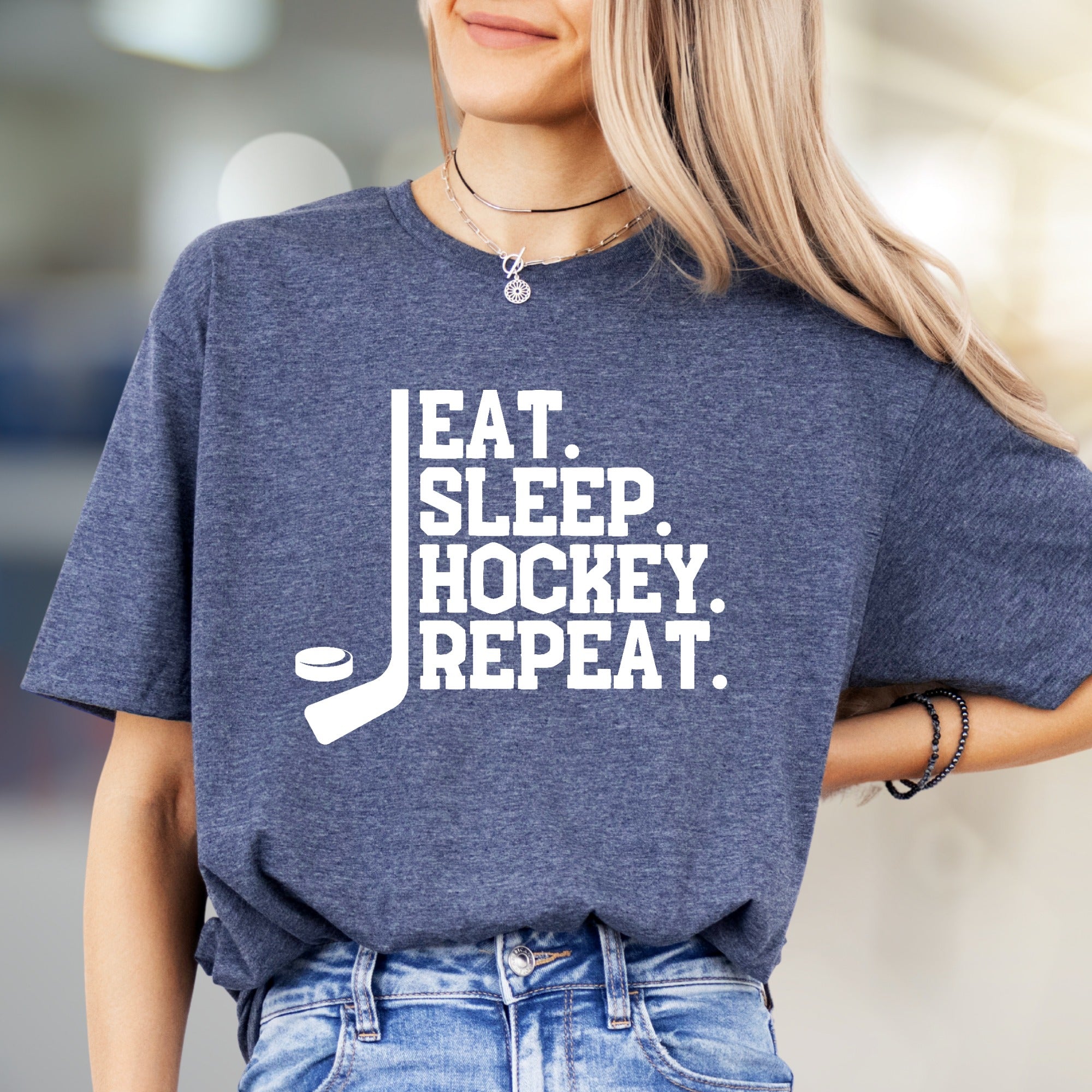 "EAT. SLEEP. HOCKEY. REPEAT." Hockey Lover Graphic Tee, a Lifestyle Pick for Sports Fans