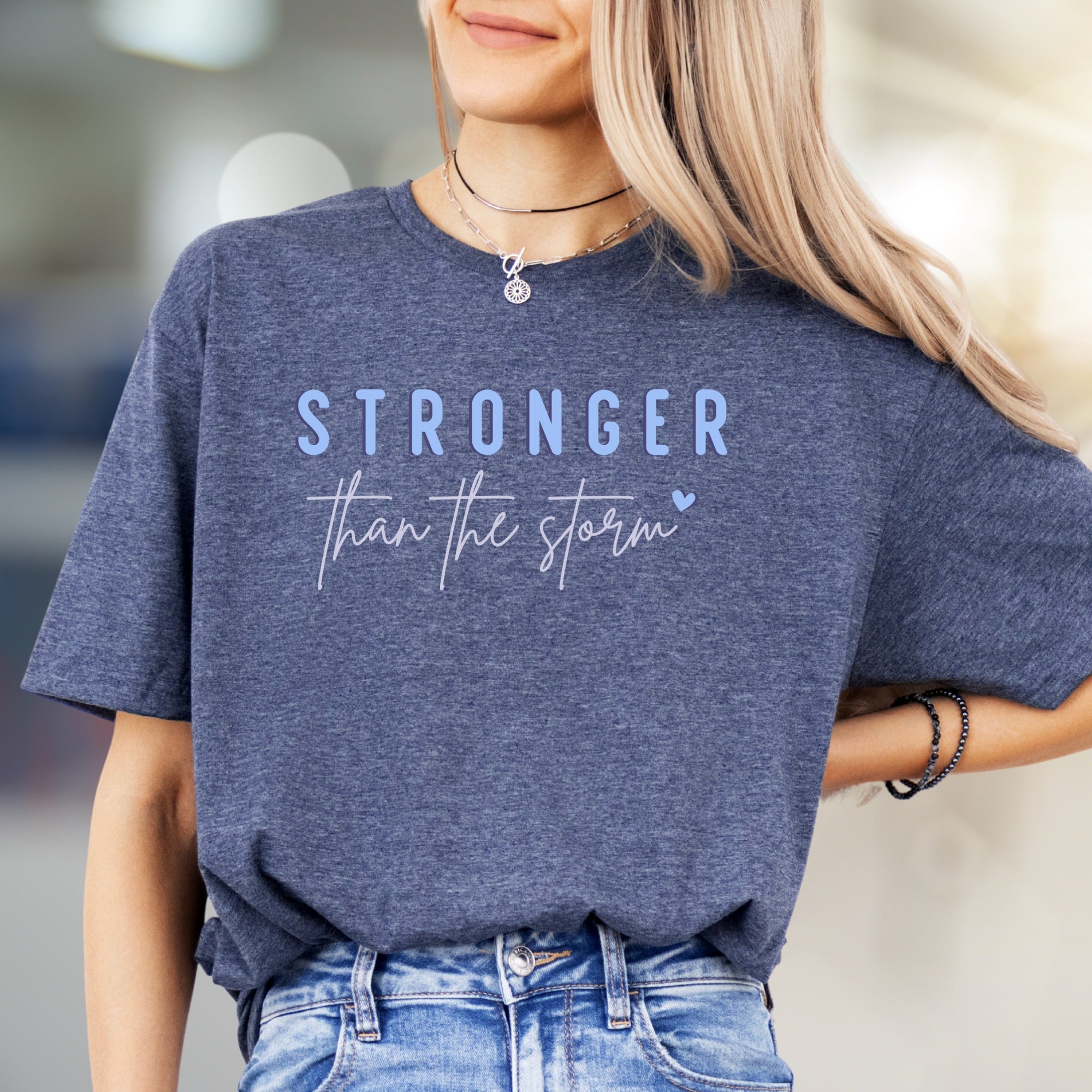 "STRONGER than the storm" Motivational Graphic Tee, an Uplifting Pick for Survivors