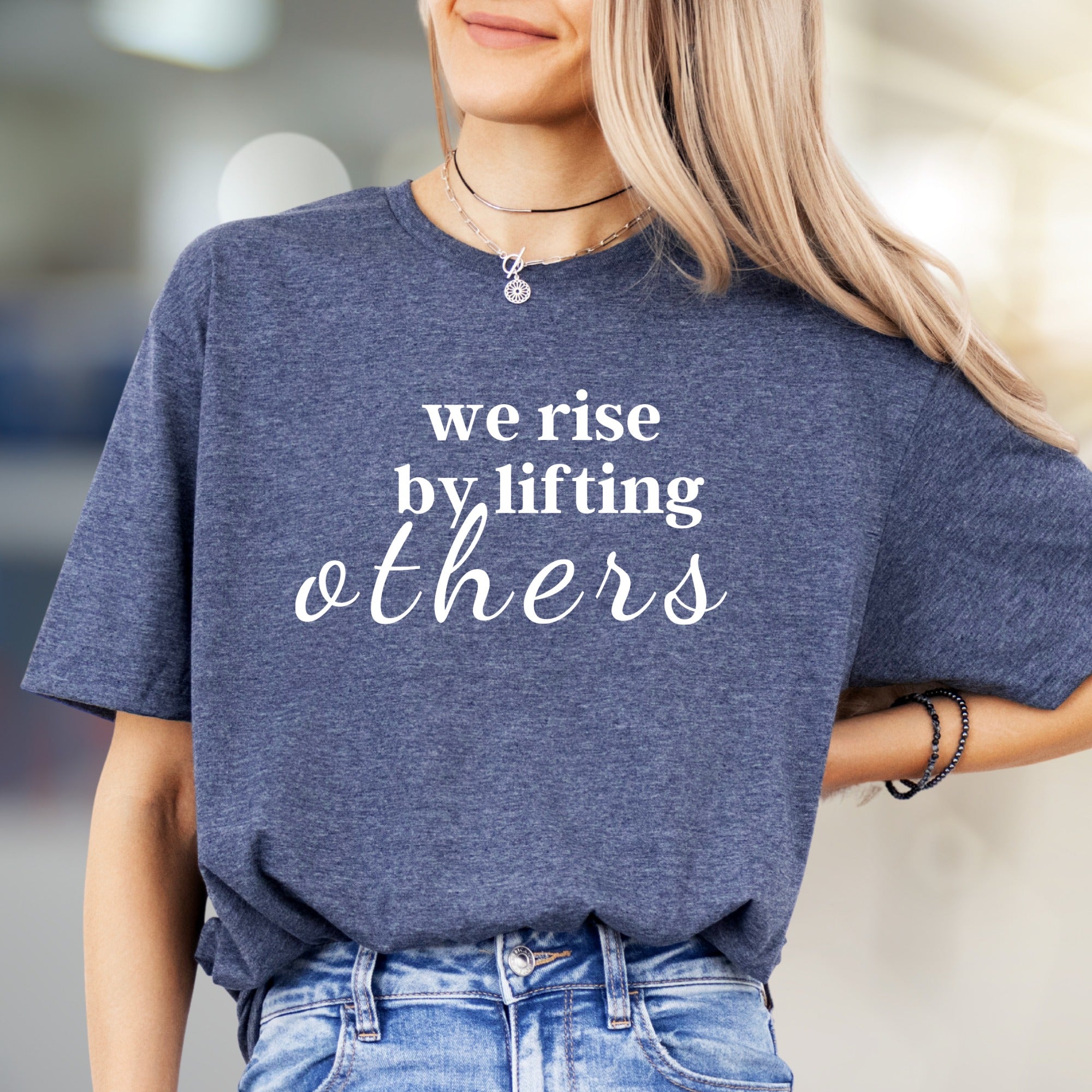 "We Rise by Lifting Others" Inspirational Graphic Tee, a Compassionate Pick for Everyday Wear
