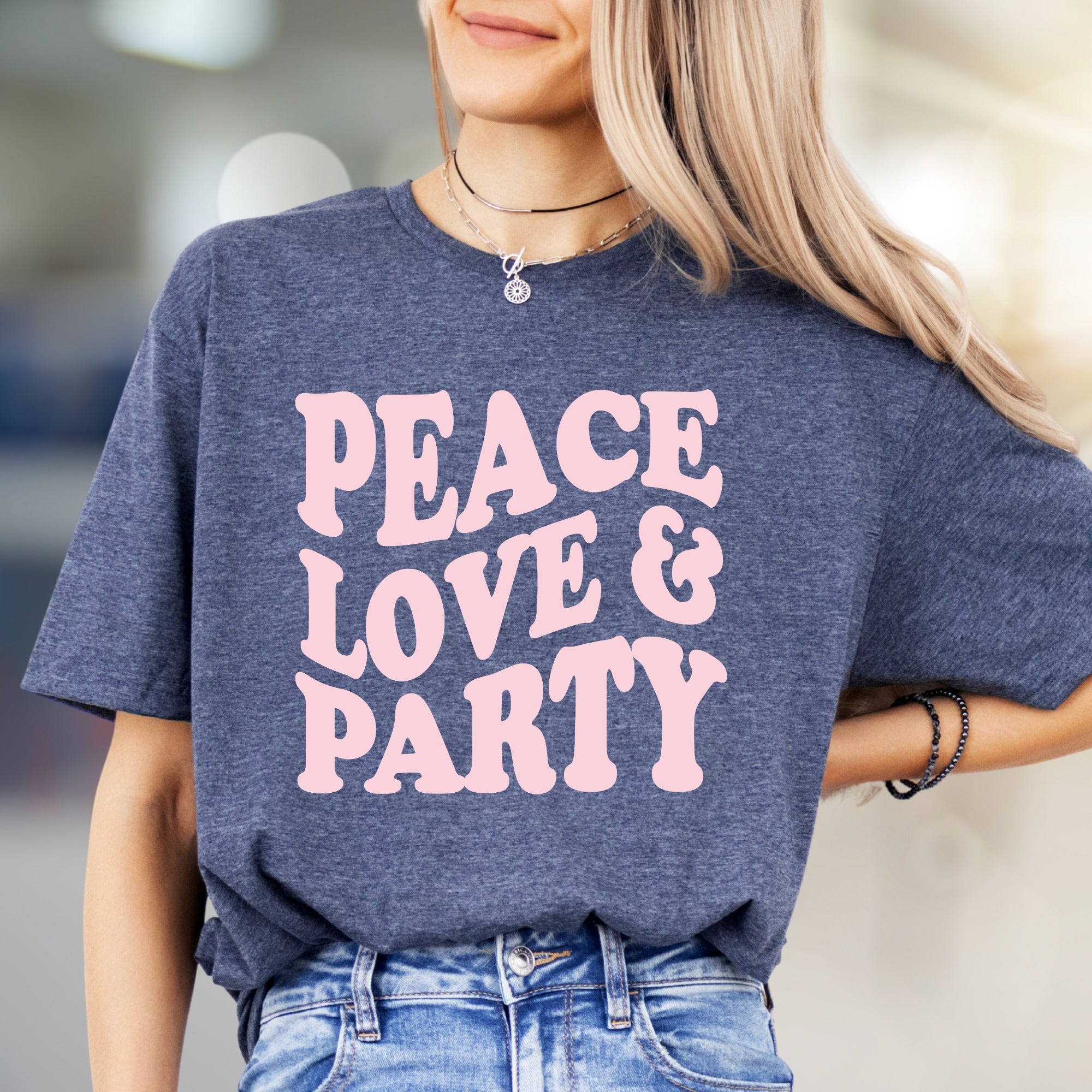 "Peace Love & Party" Groovy Graphic Tee, a Retro-Vibe Pick for Free Spirits