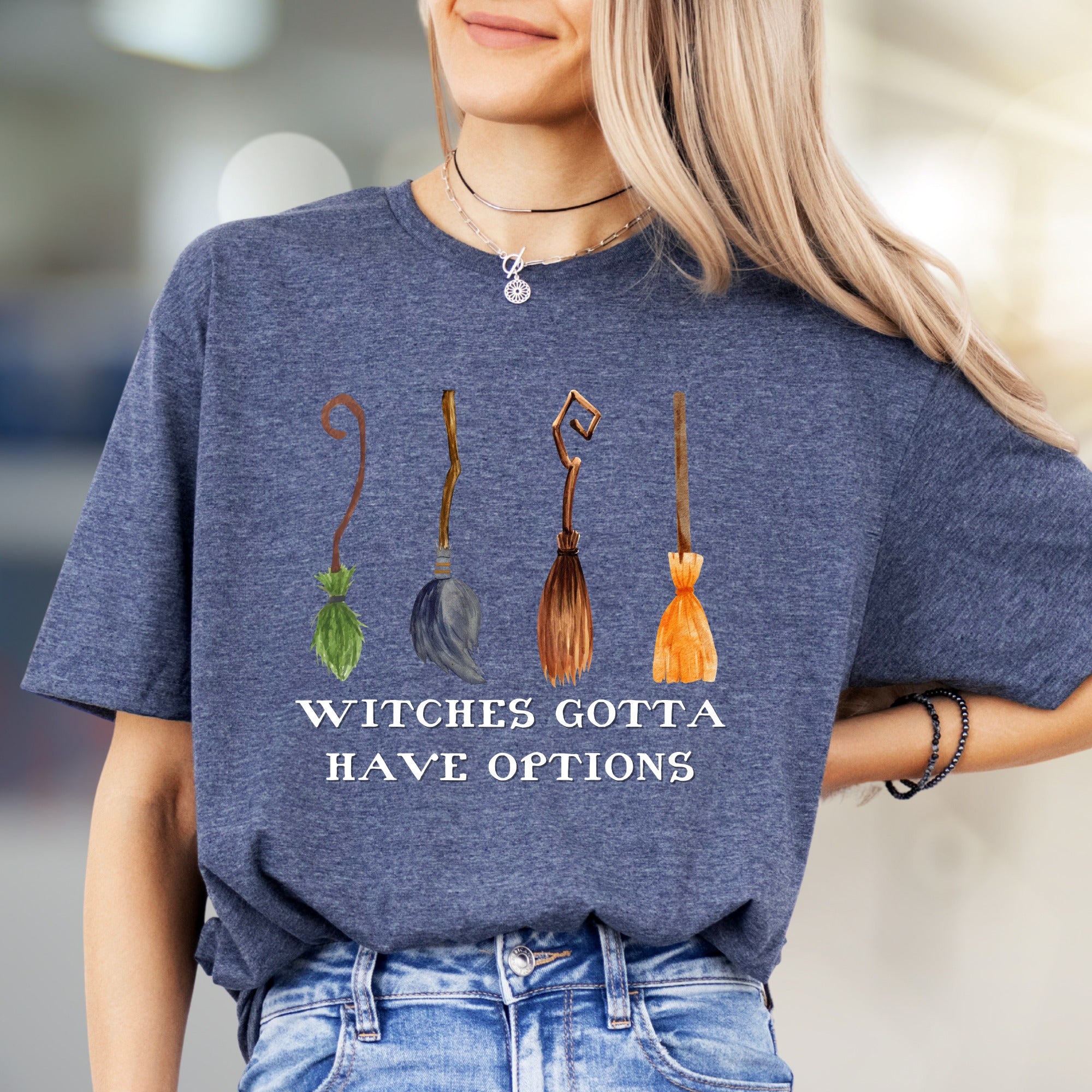 "Witches Gotta Have Options" Halloween Broomstick Graphic Unisex Tee, a Witchy Pick for Spooky Season Enthusiasts