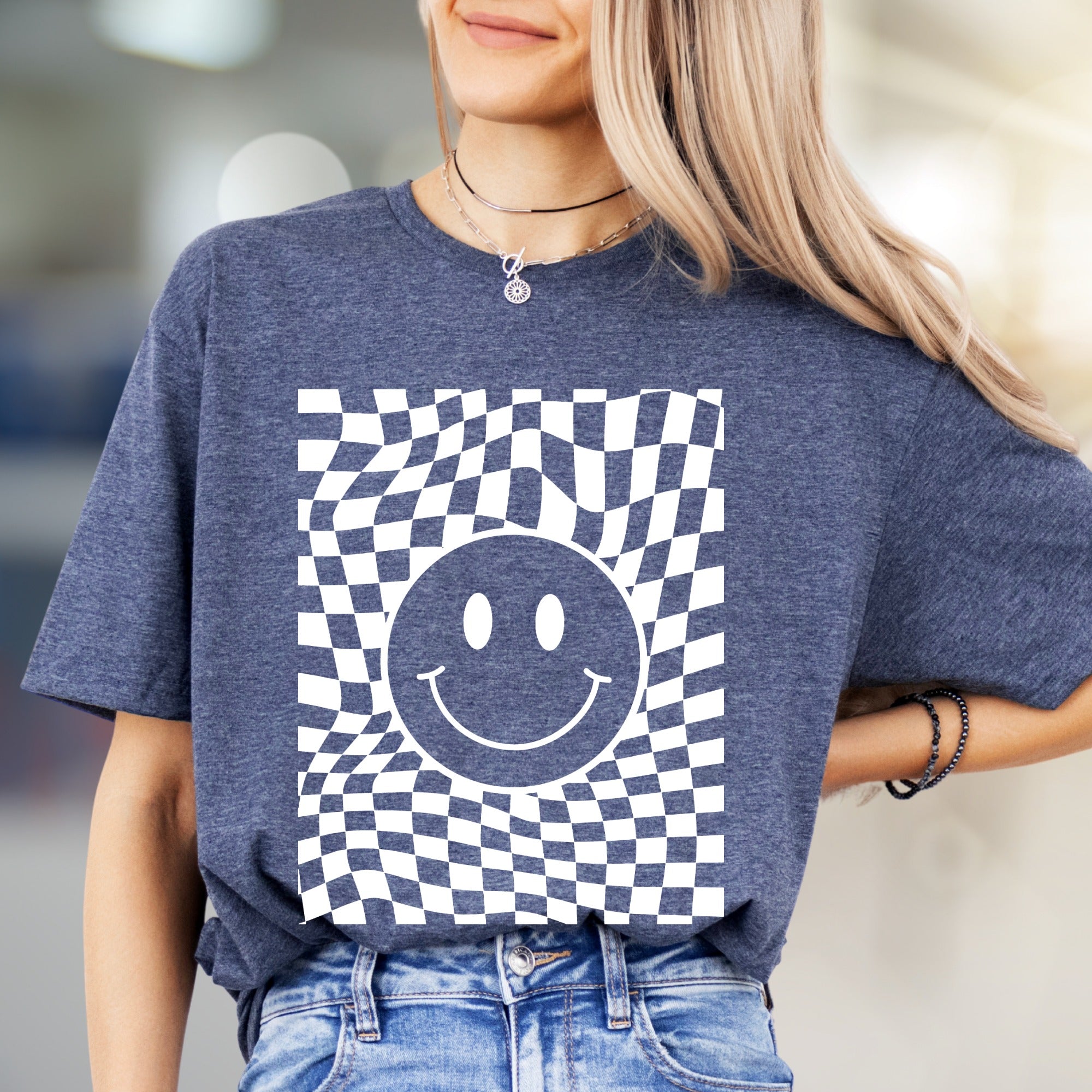 Warped Checkerboard Smiley Graphic Tee, A Retro-Inspired Pick for Free Spirits