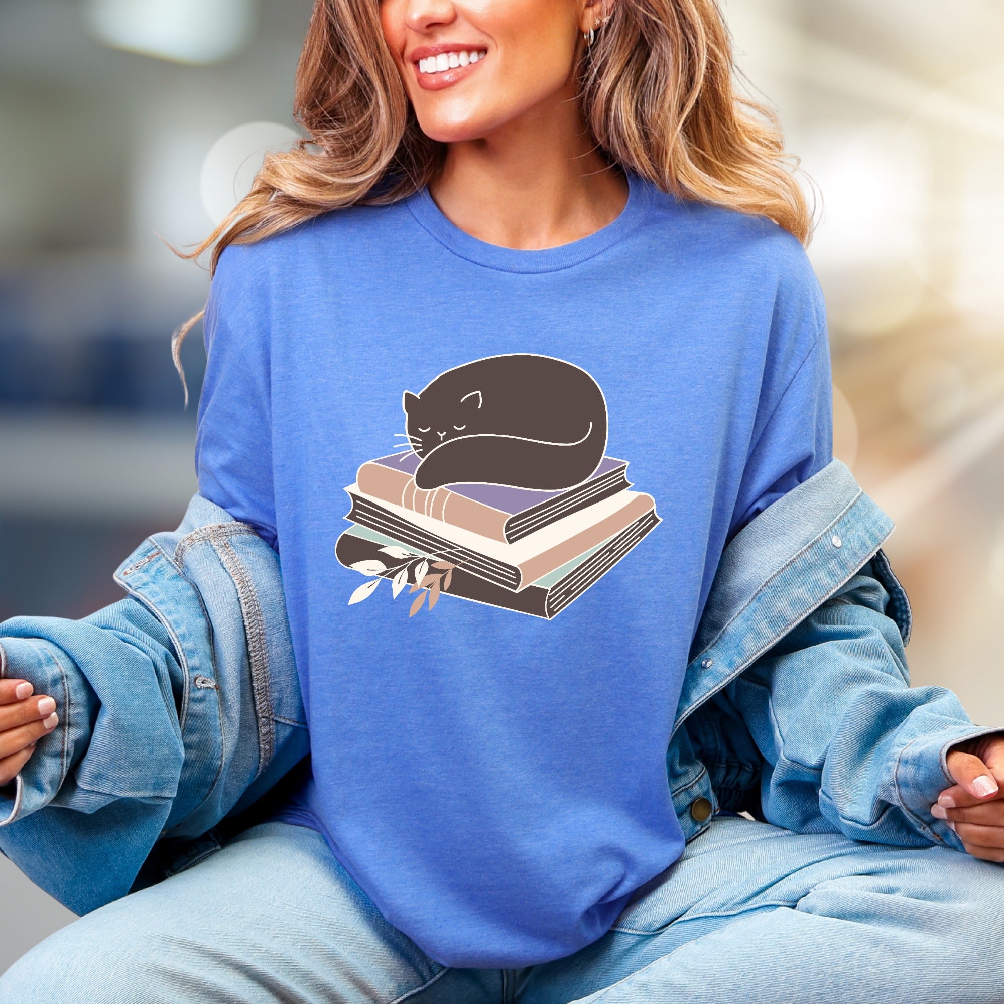 Sleeping Cat on Books Graphic Tee, a Cozy Literary Pick for Book Lovers