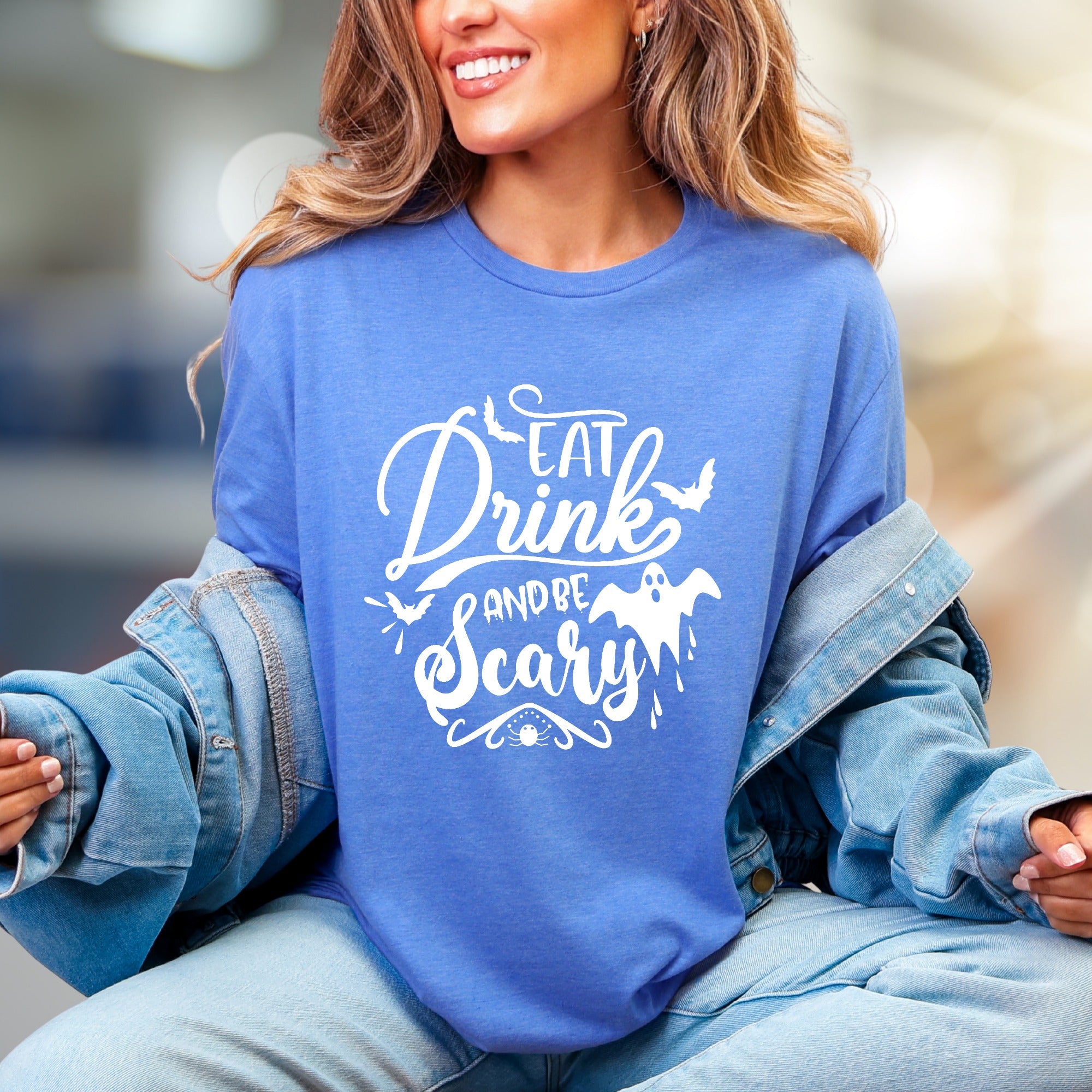 "Eat Drink And Be Scary" Halloween Graphic Tee, a Spooky Chic Pick for Partygoers