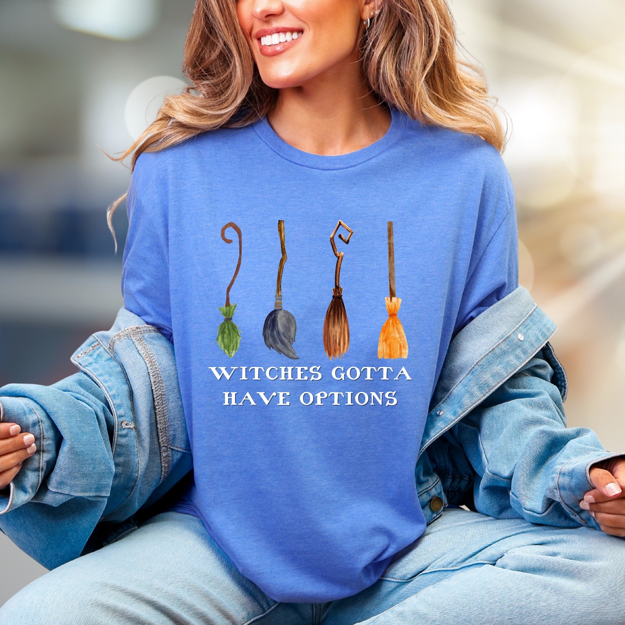 "Witches Gotta Have Options" Halloween Broomstick Graphic Unisex Tee, a Witchy Pick for Spooky Season Enthusiasts
