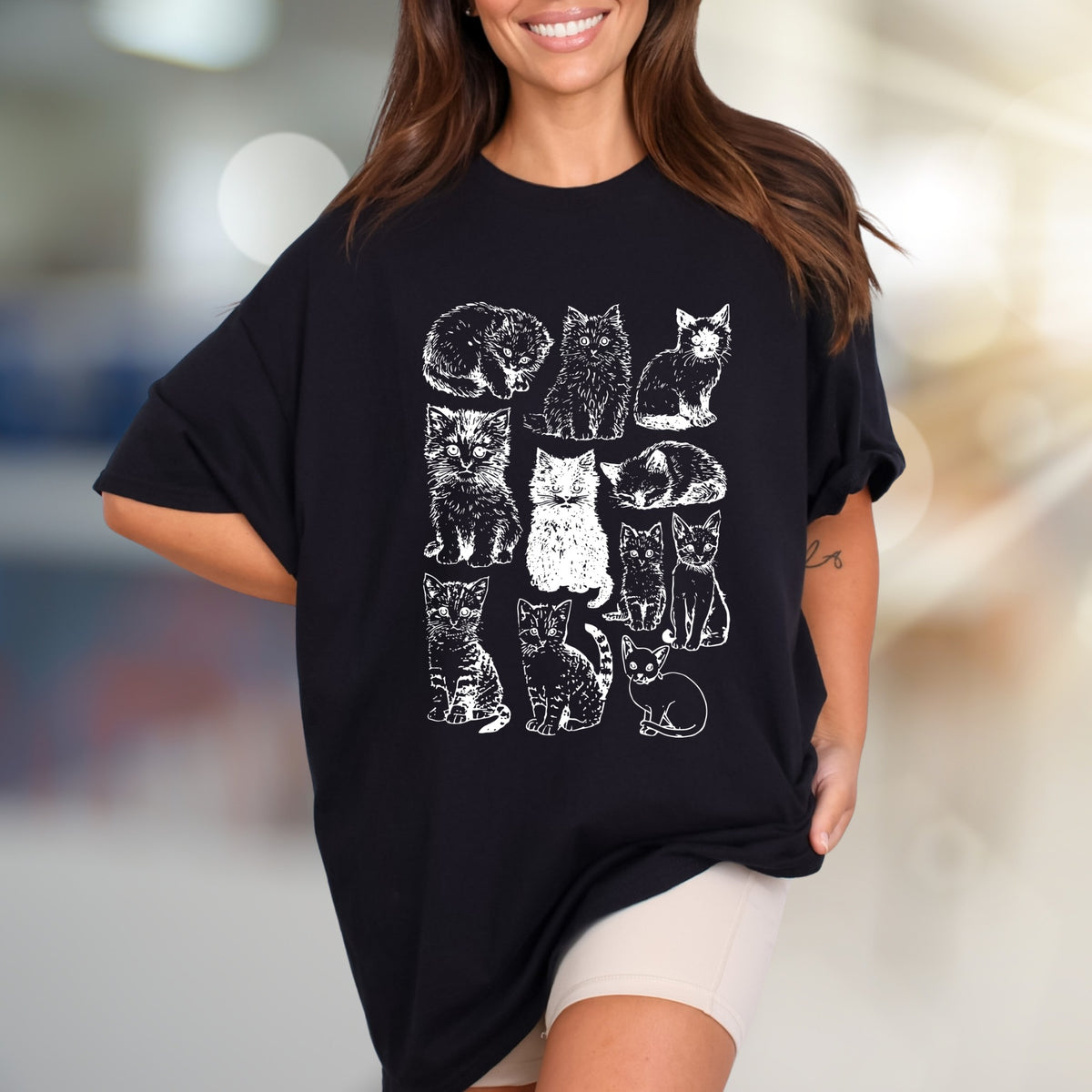 Charming Cat Sketches Graphic Tee, a Feline Lover's Artful Pick