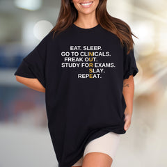 "EAT. SLEEP. GO TO CLINICALS. FREAK OUT. STUDY FOR EXAMS. SLAY. REPEAT." Nurse Life Unisex Tee, a Student Motivation Pick for Healthcare Heroes
