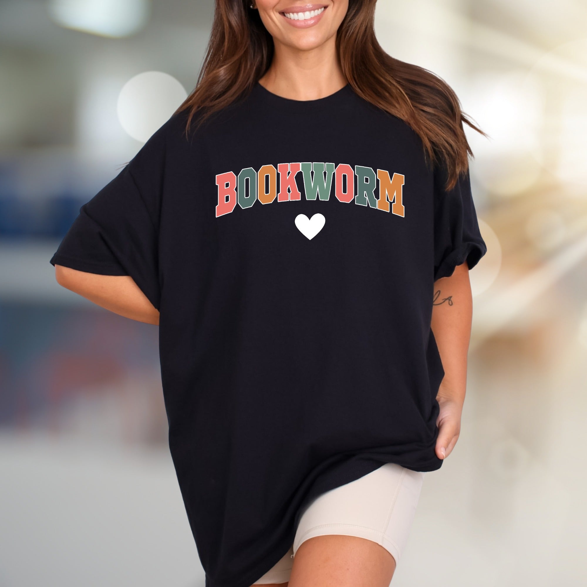 "BOOKWORM" Playful Arch Graphic Tee, a Literary Enthusiast's Everyday Style