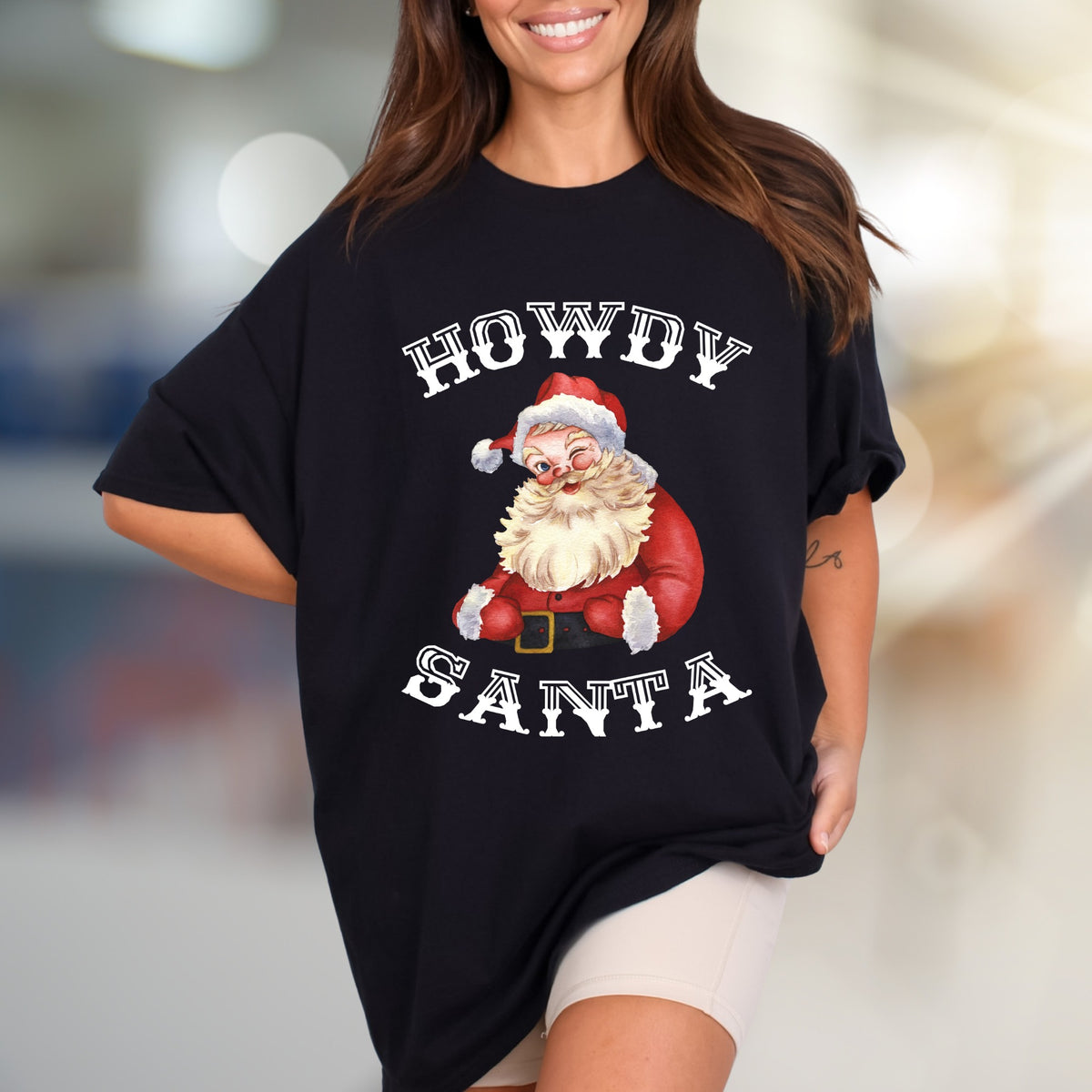 “Howdy Santa” Winking Santa Graphic Tee, a Festive Country Pick for Christmas Lovers