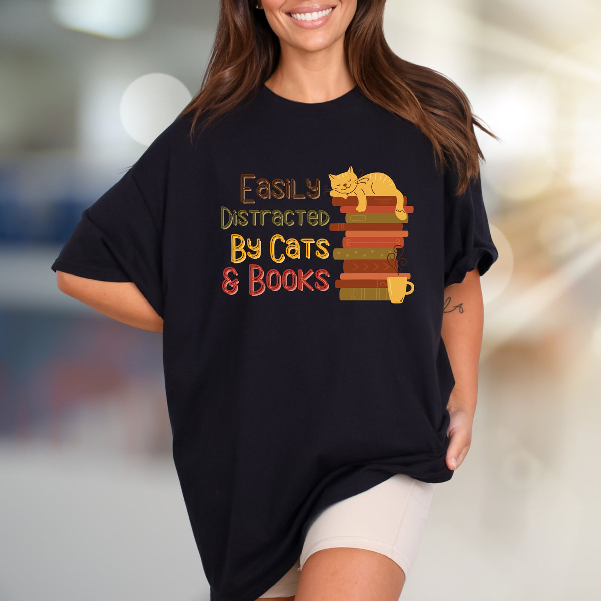 "Easily Distracted By Cats & Books" Cozy Reader Graphic Tee, a Feline Fan Pick for Book Lovers