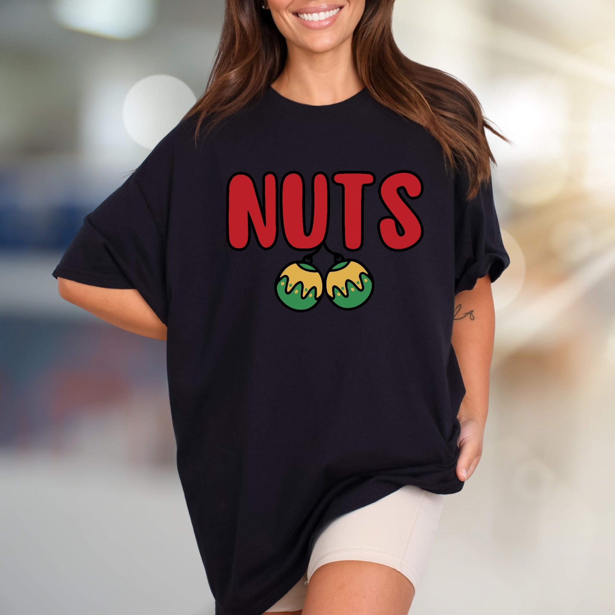 "NUTS" Holiday Balls Graphic Tee, a Festive Pick for Humor Enthusiasts