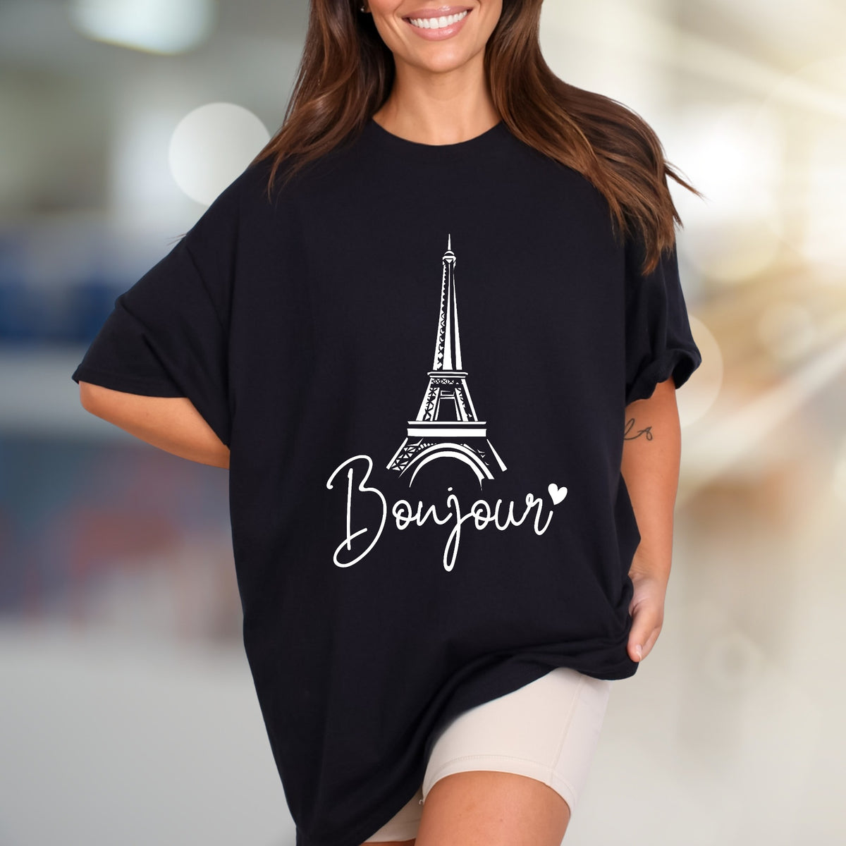 "Bonjour" Eiffel Tower Graphic Tee, a Parisian Chic Pick for Travelers