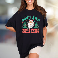 “Don't Stop Believin'” Retro Christmas Graphic Tee, a Festive Holiday Pick for Enthusiasts