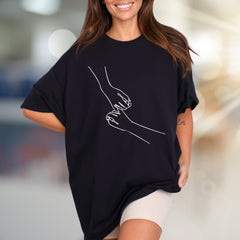 Holding Hands Line Art Graphic Tee, A Nurturing Pick for Relationship Enthusiasts