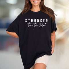 "STRONGER than the storm" Motivational Graphic Tee, an Uplifting Pick for Resilience Seekers