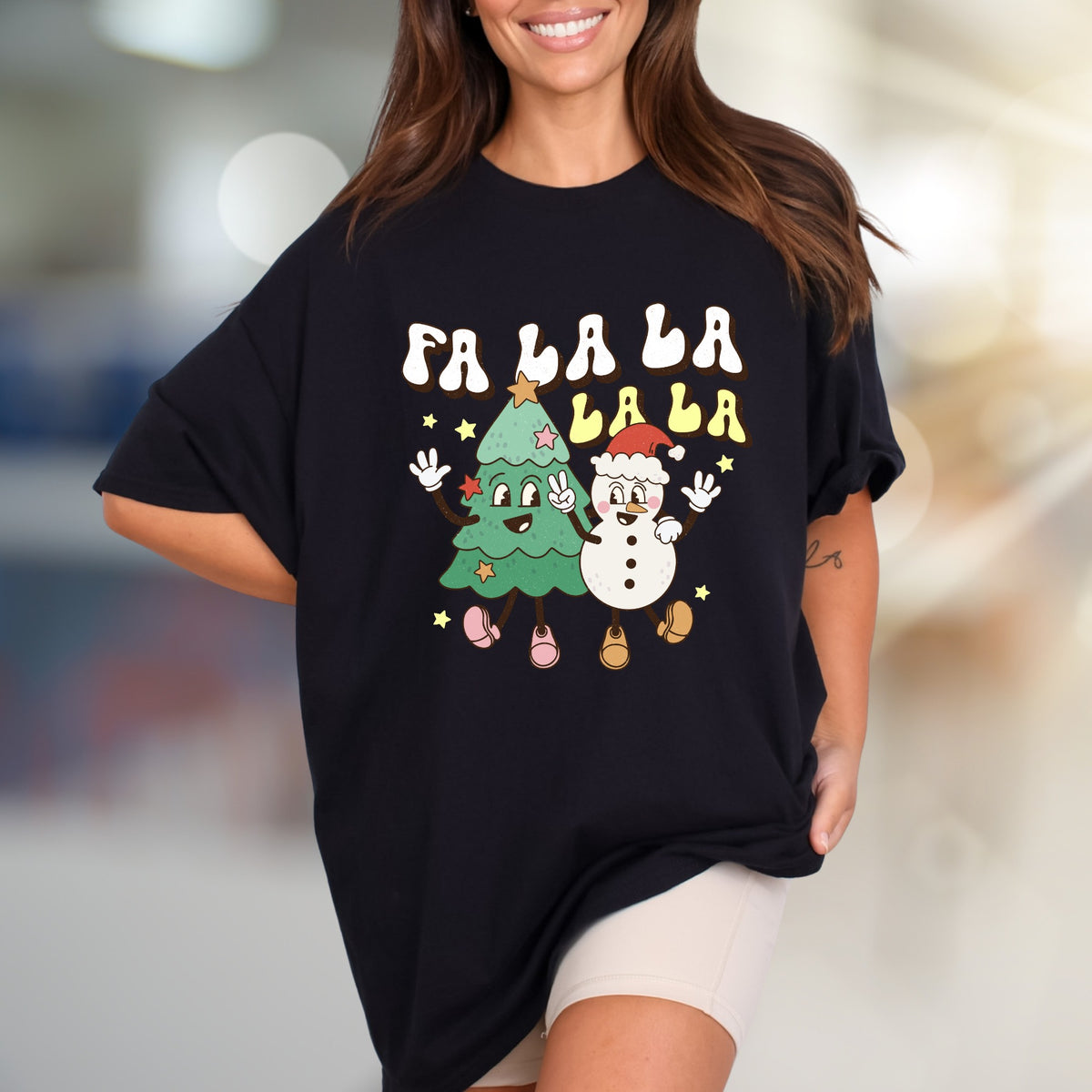 "Fa La La La La" Retro Holiday Graphic Tee, a Festive Pick for Christmas Enthusiasts