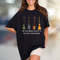"Witches Gotta Have Options" Halloween Broomstick Graphic Unisex Tee, a Witchy Pick for Spooky Season Enthusiasts