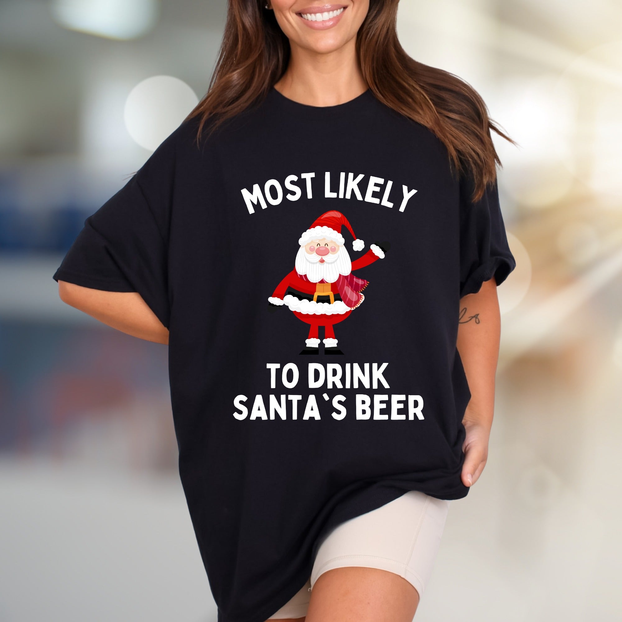 Most Likely To Drink Santa's Beer Funny Christmas Graphic Tee, a Holiday Humor Pick for Festive Adults
