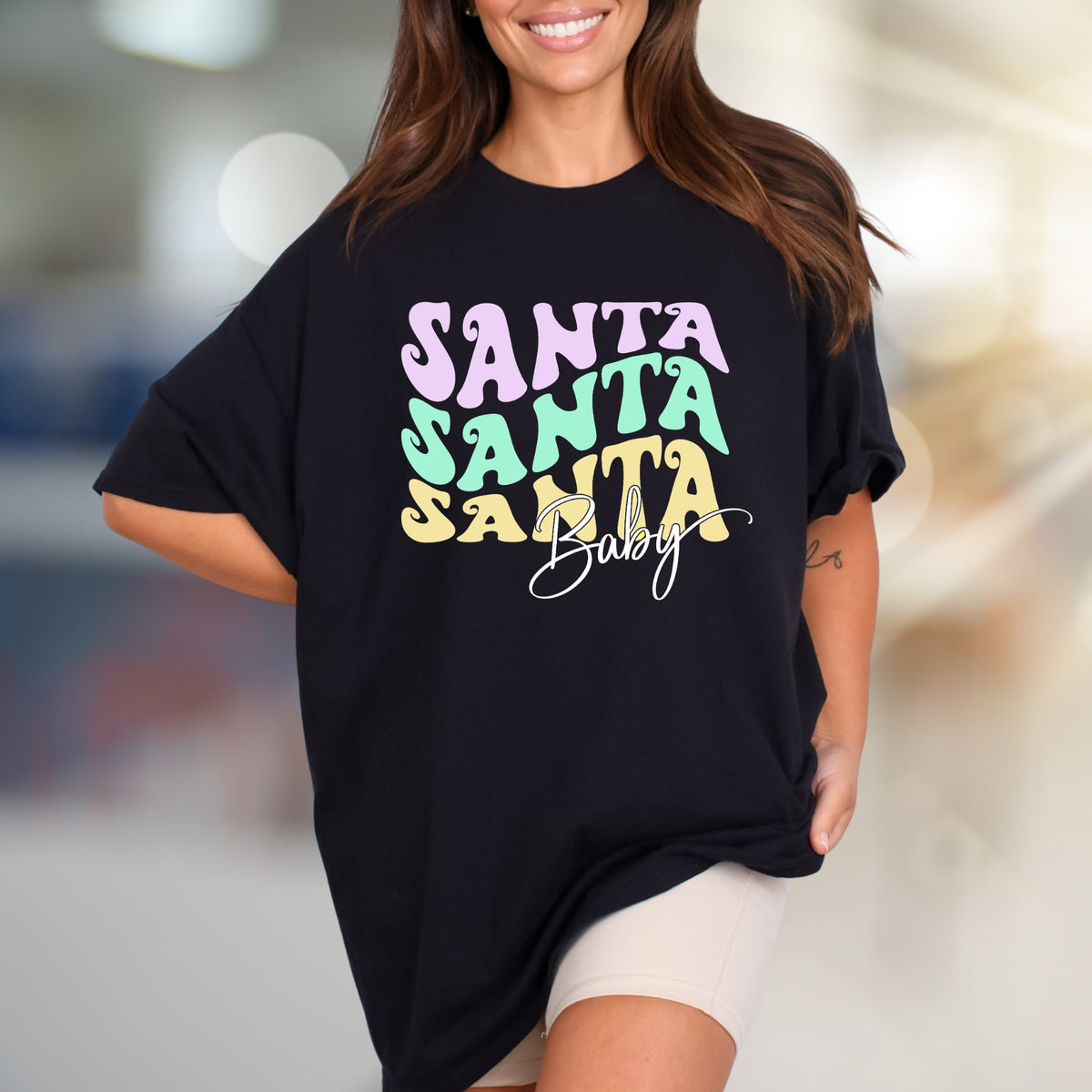 "SANTA SANTA SANTA Baby" Retro Christmas Graphic Tee, a Festive Niche for Holiday Enthusiasts