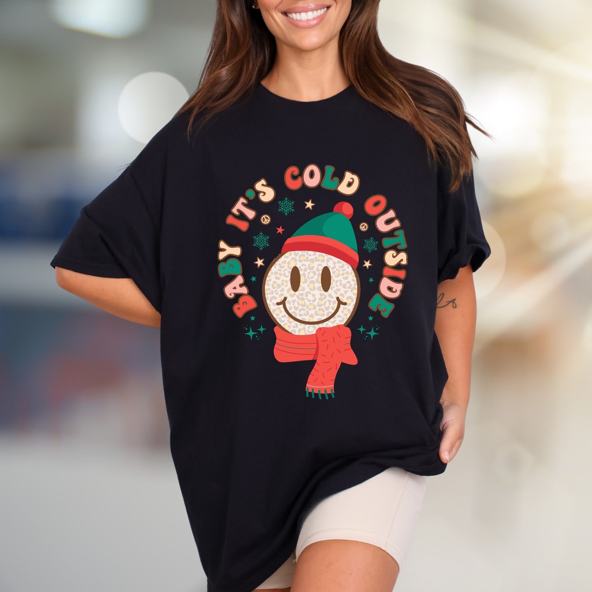 "Baby It's Cold Outside" Winter Smiley Graphic Tee, a Festive Comfort Pick for Holiday Lovers