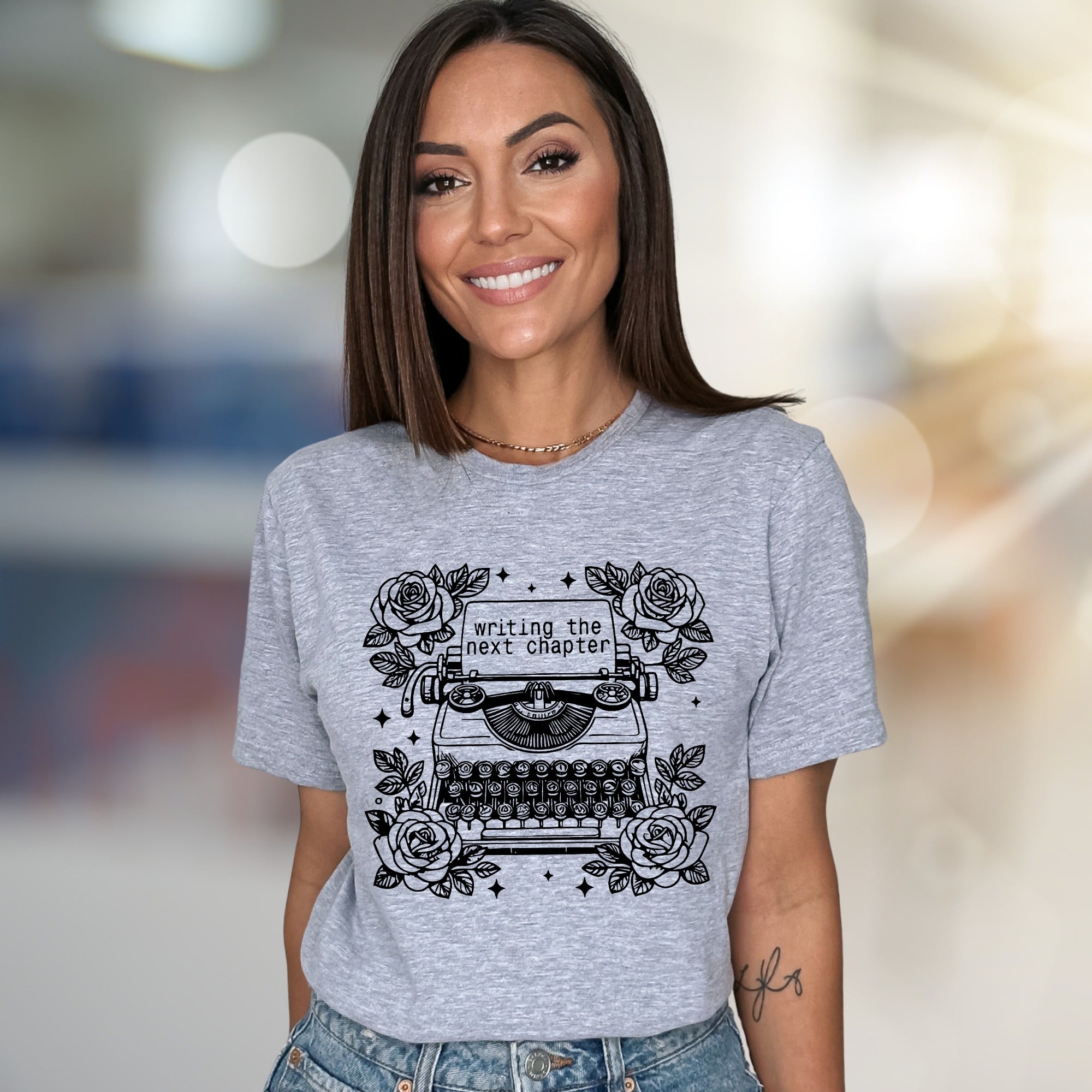 "Writing The Next Chapter" Typewriter Graphic Tee, a Creative Literary Pick for Authors
