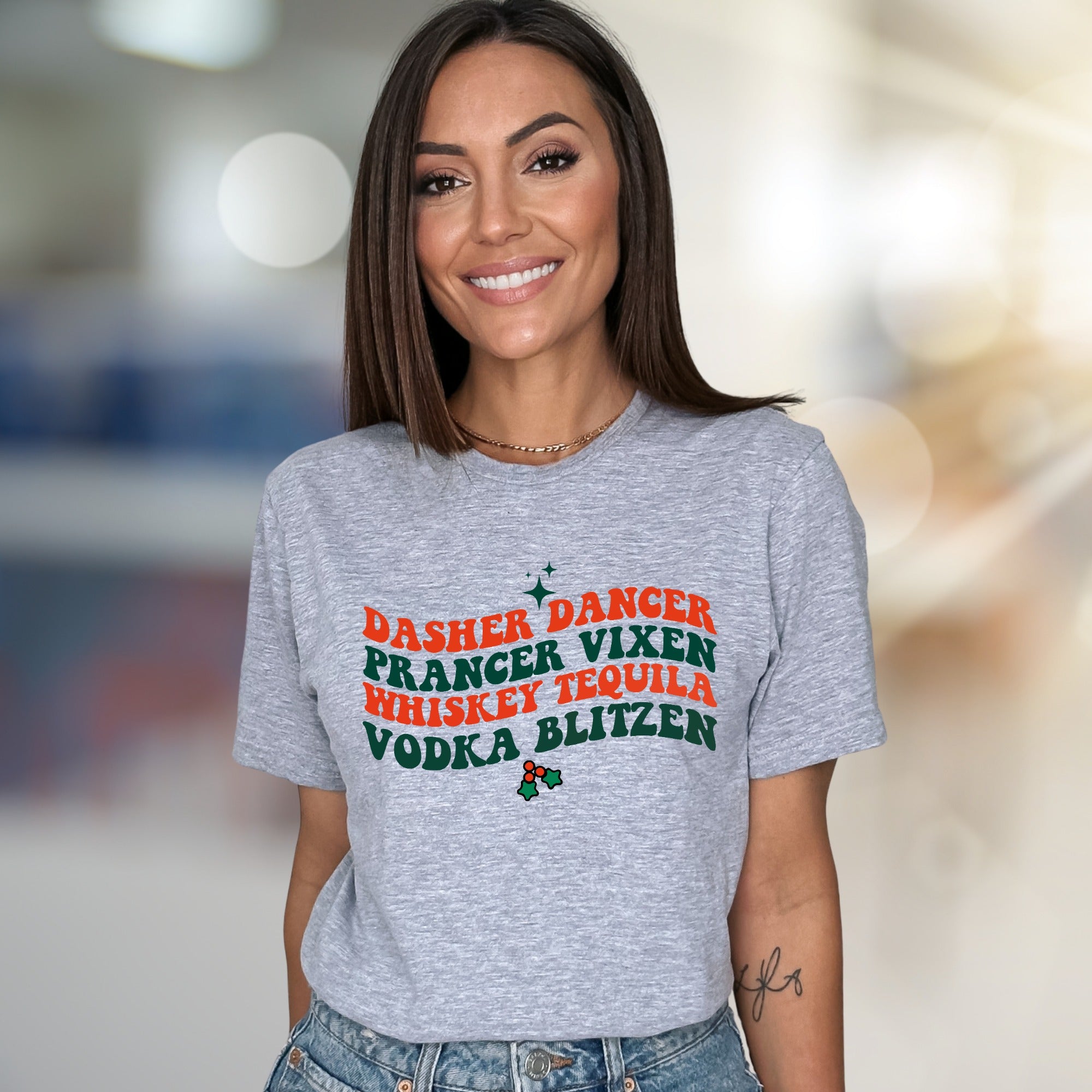 "Dasher Dancer Vixen Whiskey Tequila Vodka Blitzen" Festive Graphic Tee, a Holiday Humor Pick for Party-Goers