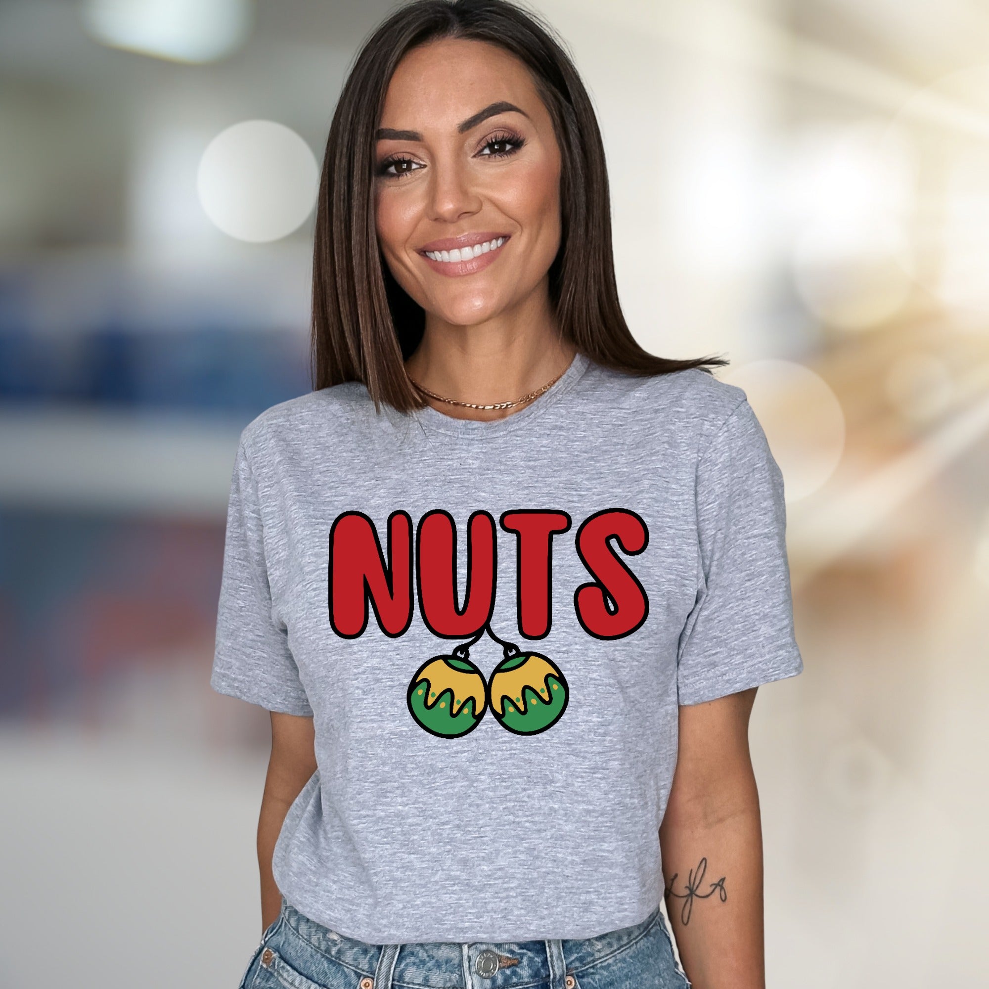 "NUTS" Holiday Balls Graphic Tee, a Festive Pick for Humor Enthusiasts