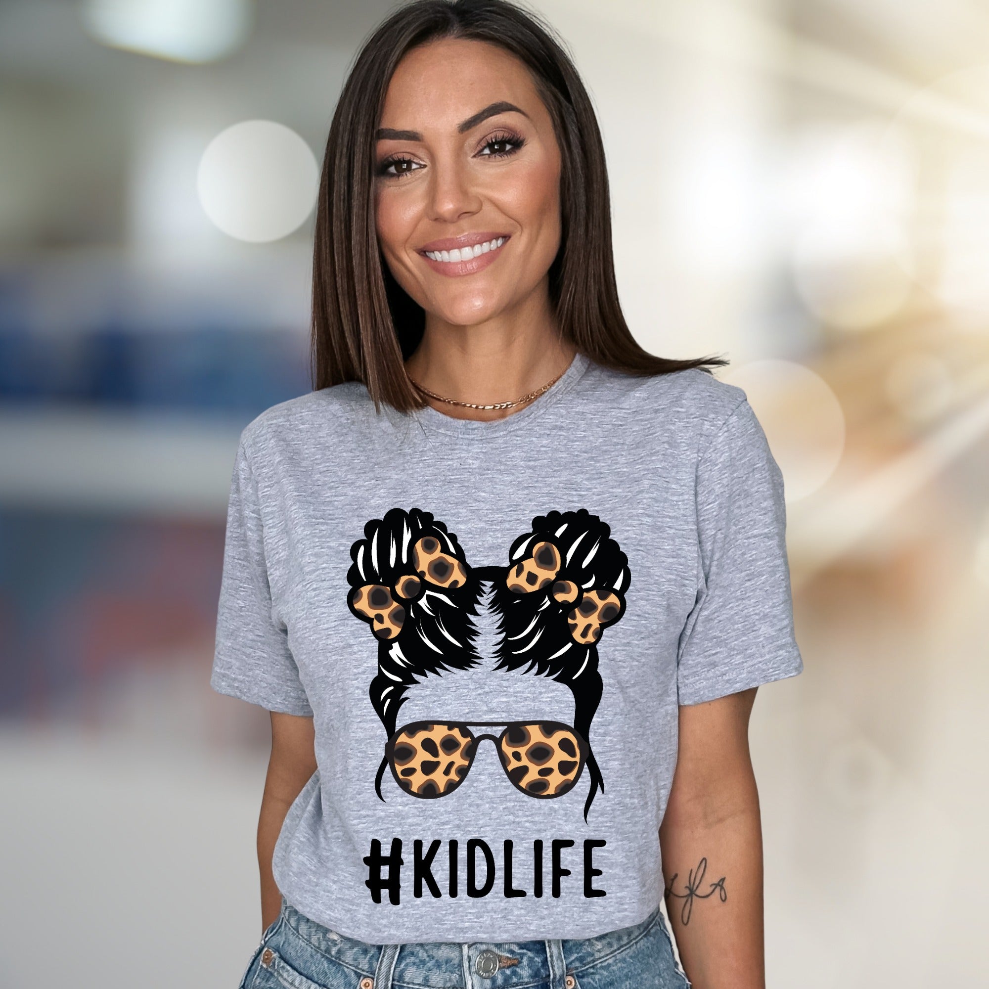 #KIDLIFE Messy Hair Bun Leopard Sunglasses Graphic Tee, a Mom Life Pick for Parents