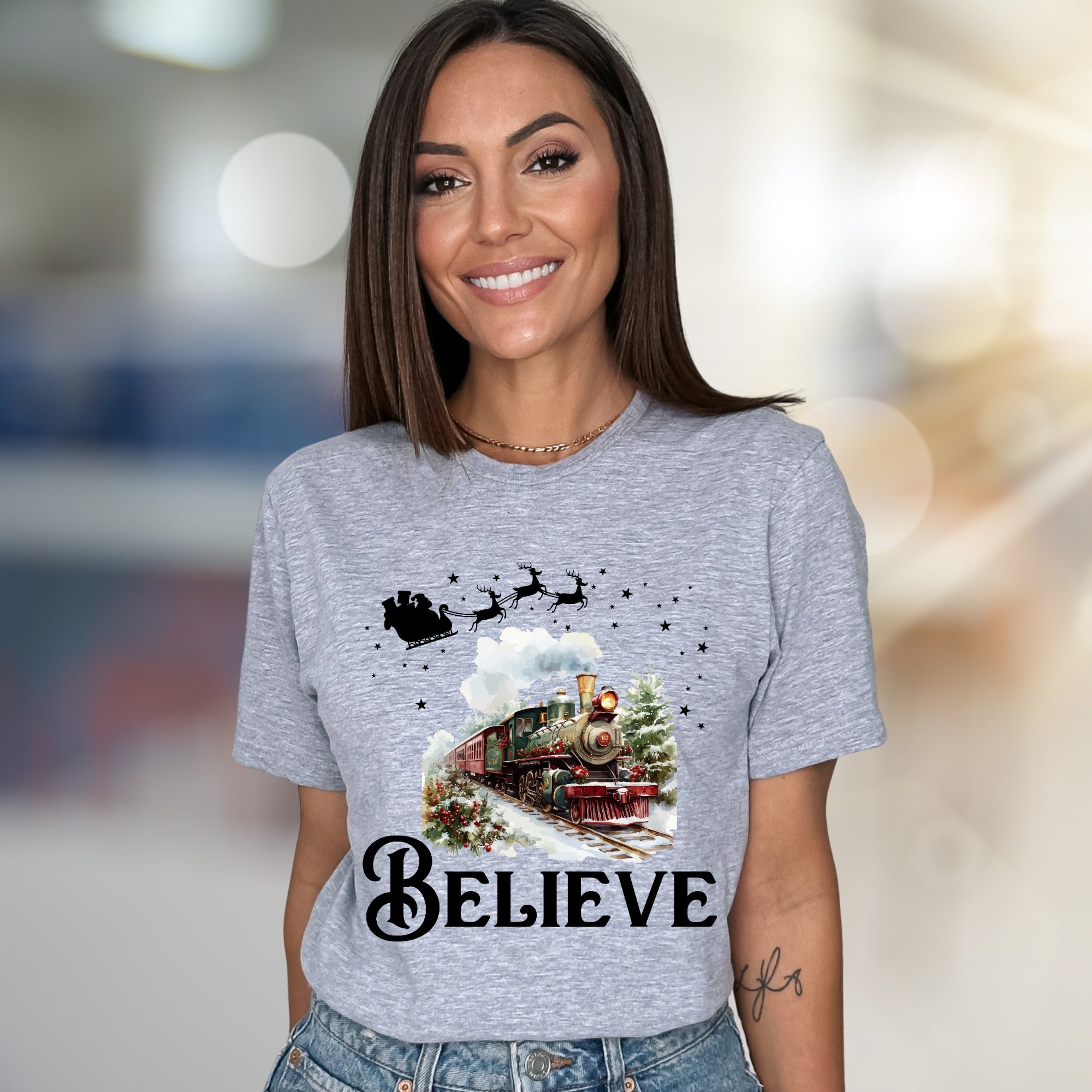 "BELIEVE" Christmas Train Graphic Tee, a Winter Wonderland Pick for Holiday Enthusiasts