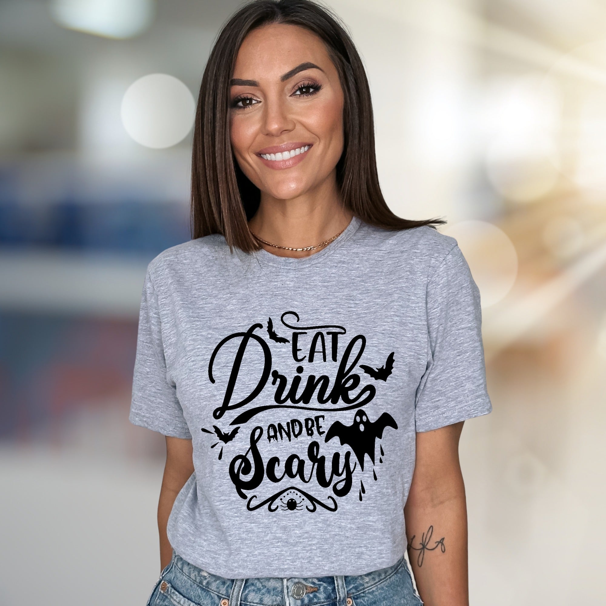 "Eat Drink And Be Scary" Halloween Graphic Tee, a Spooky Chic Pick for Partygoers