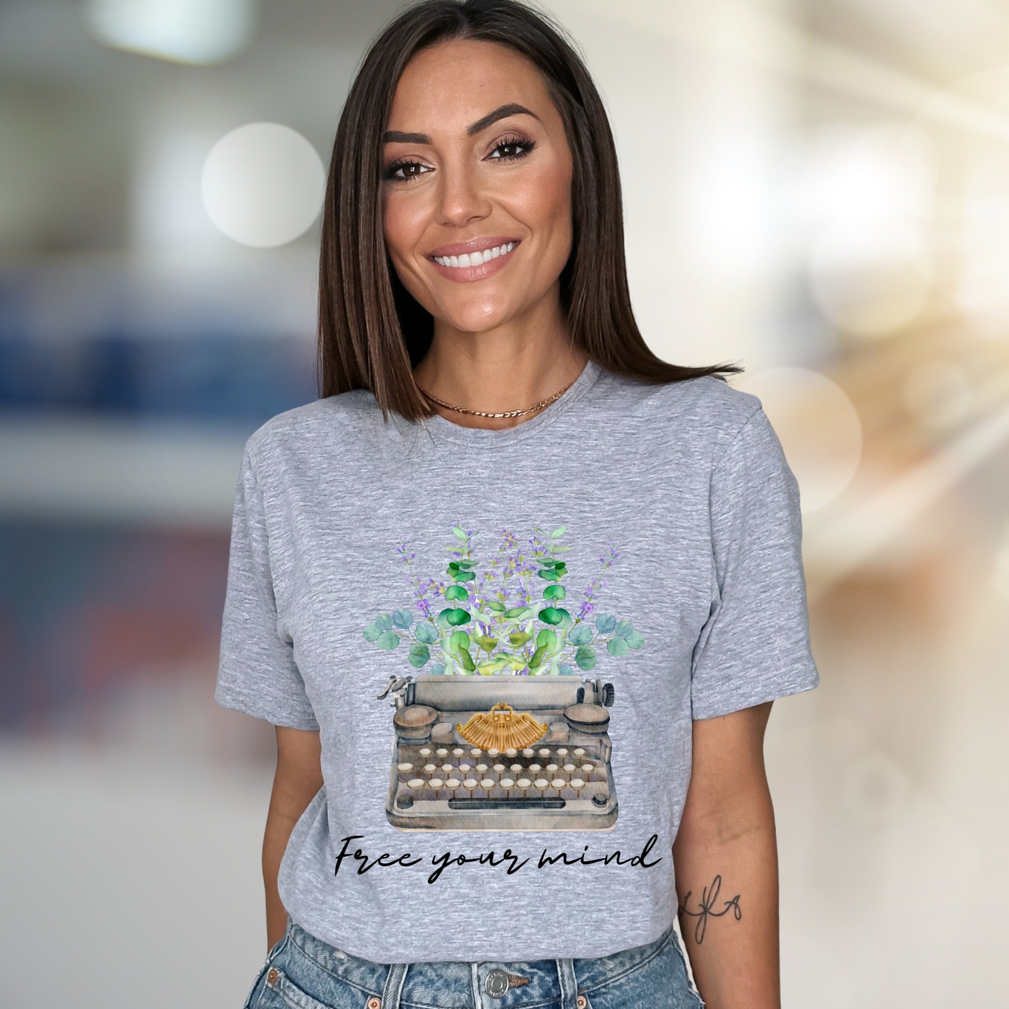 "Free Your Mind" Typewriter Floral Graphic Tee, a Creative Expression Unisex Tee