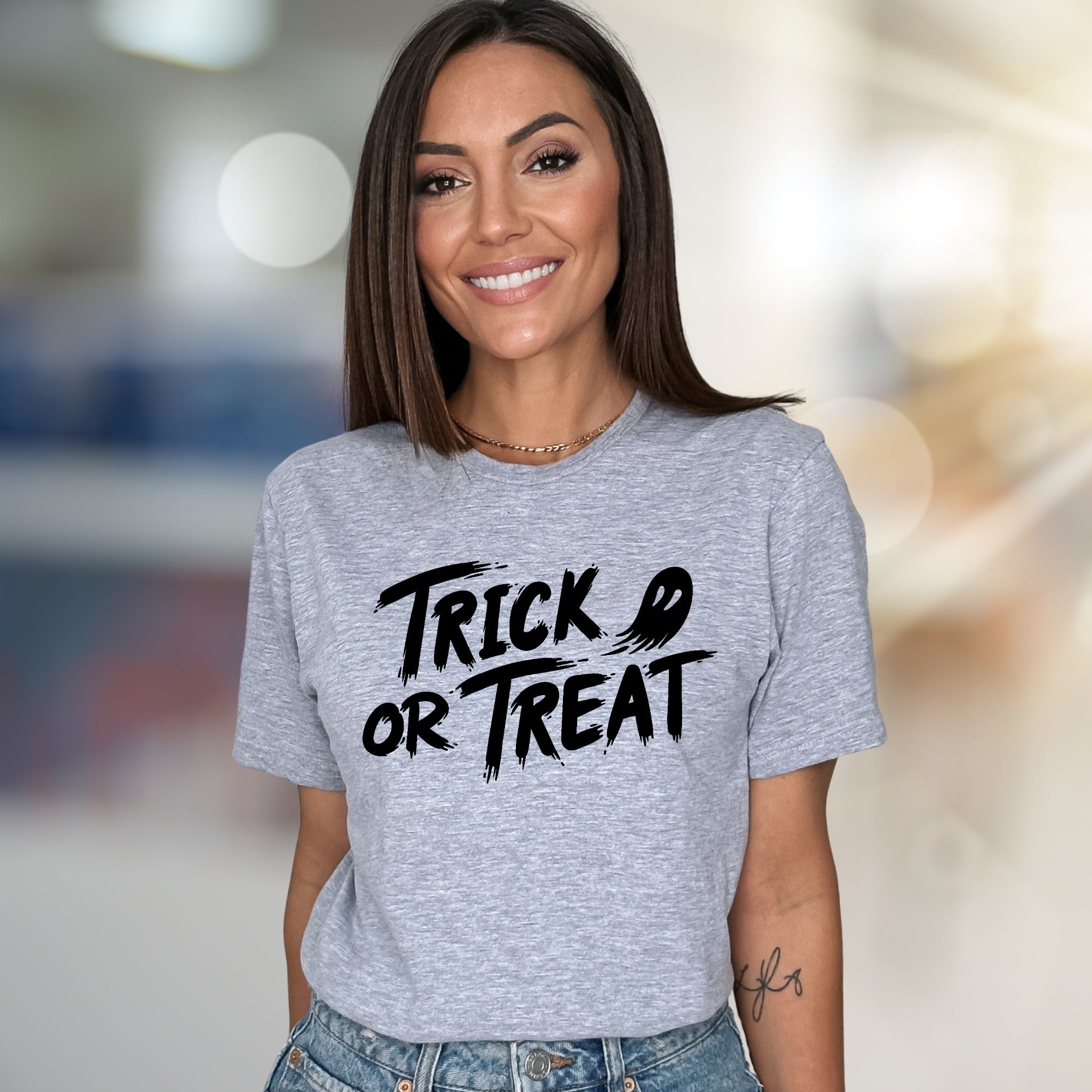 "Trick or Treat" Spooky Ghost Graphic Tee, a Halloween Pick for Party-Goers