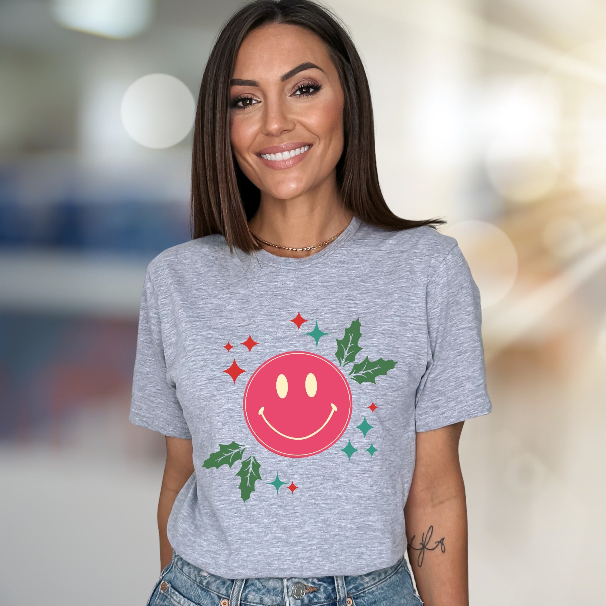 Happy Holly Jolly Smile Face Graphic Tee, a Festive Comfort Pick for Joyful Spirits