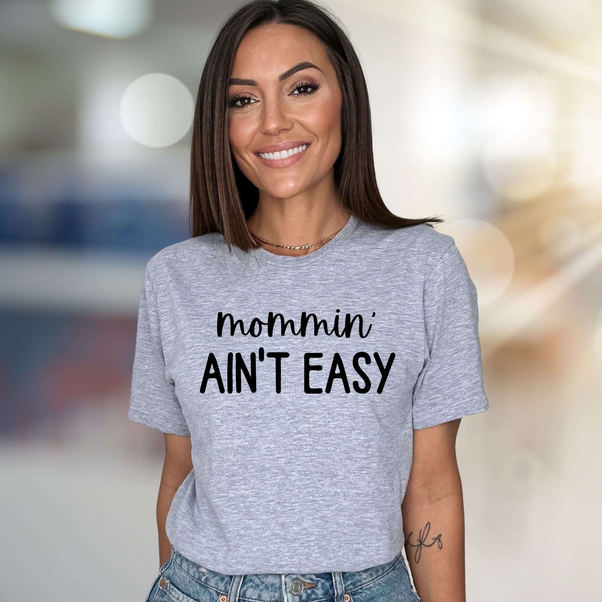 "Mommin' Ain't Easy" Humorous Graphic Tee, a Relatable Pick for Moms