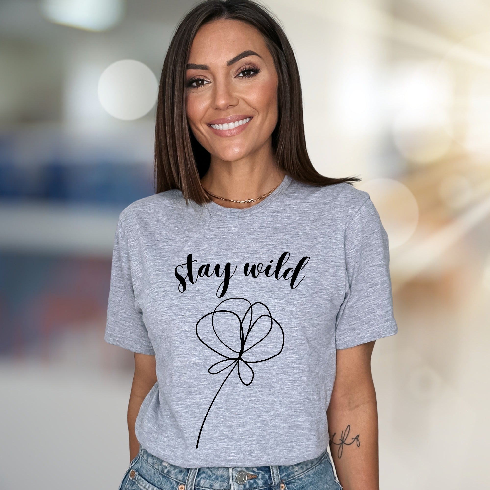 "Stay Wild" Minimalist Flower Graphic Tee, a Boho Chic Pick for Free Spirits