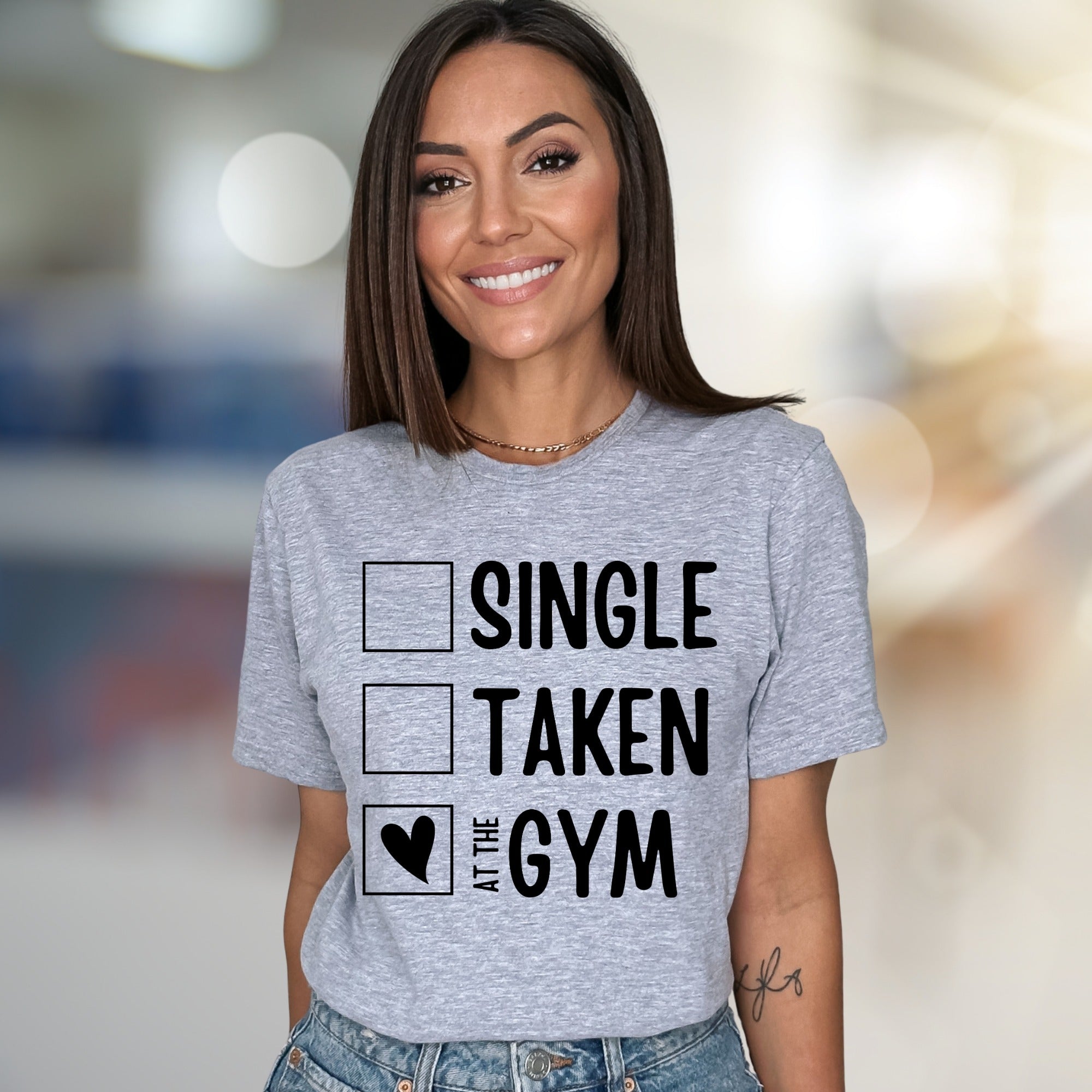 "Single, Taken, At The Gym" Workout Graphic Tee, a Fitness Humor Pick for Gym Lovers