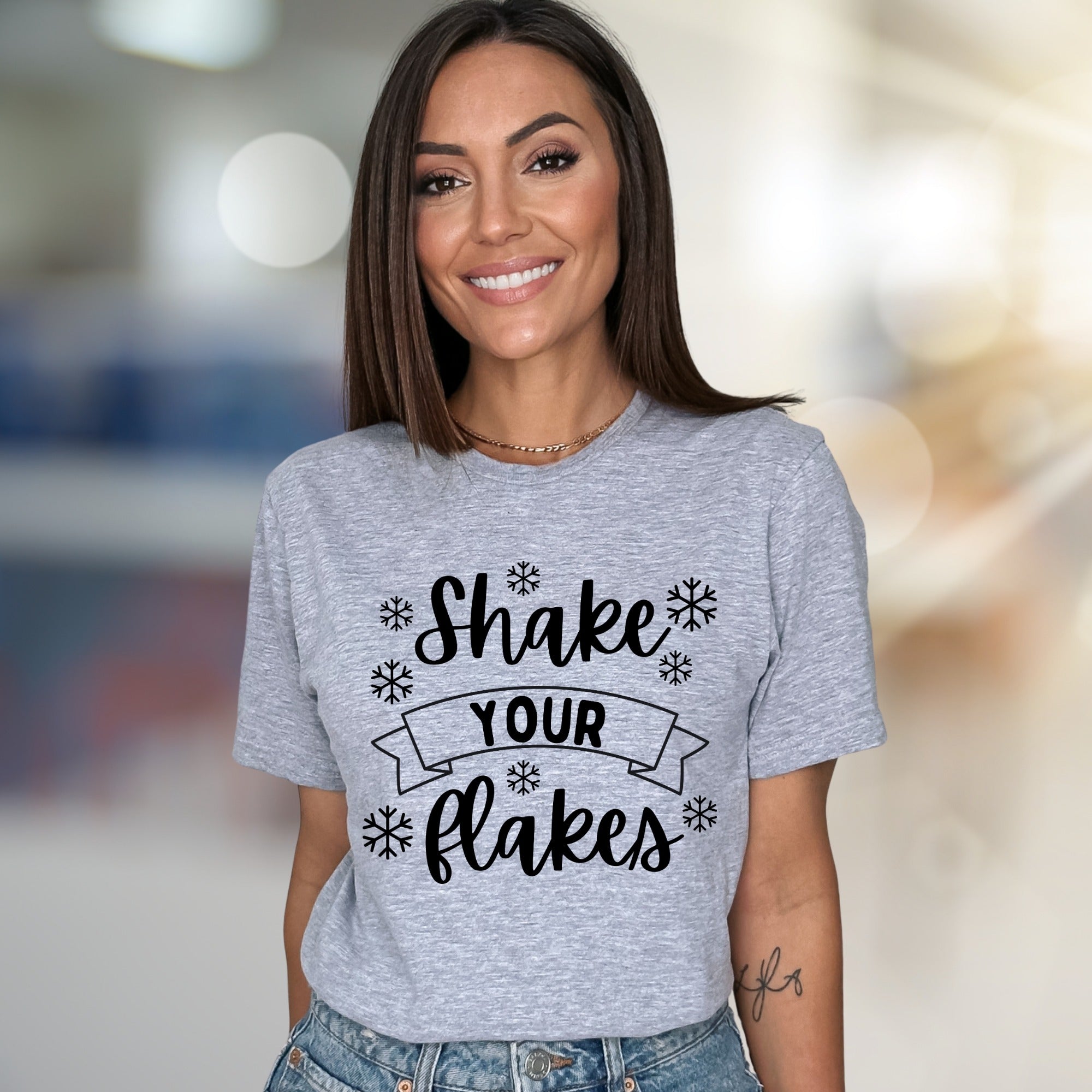 "Shake Your Flakes" Winter Fun Graphic Tee, a Playful Holiday Pick for Everyone