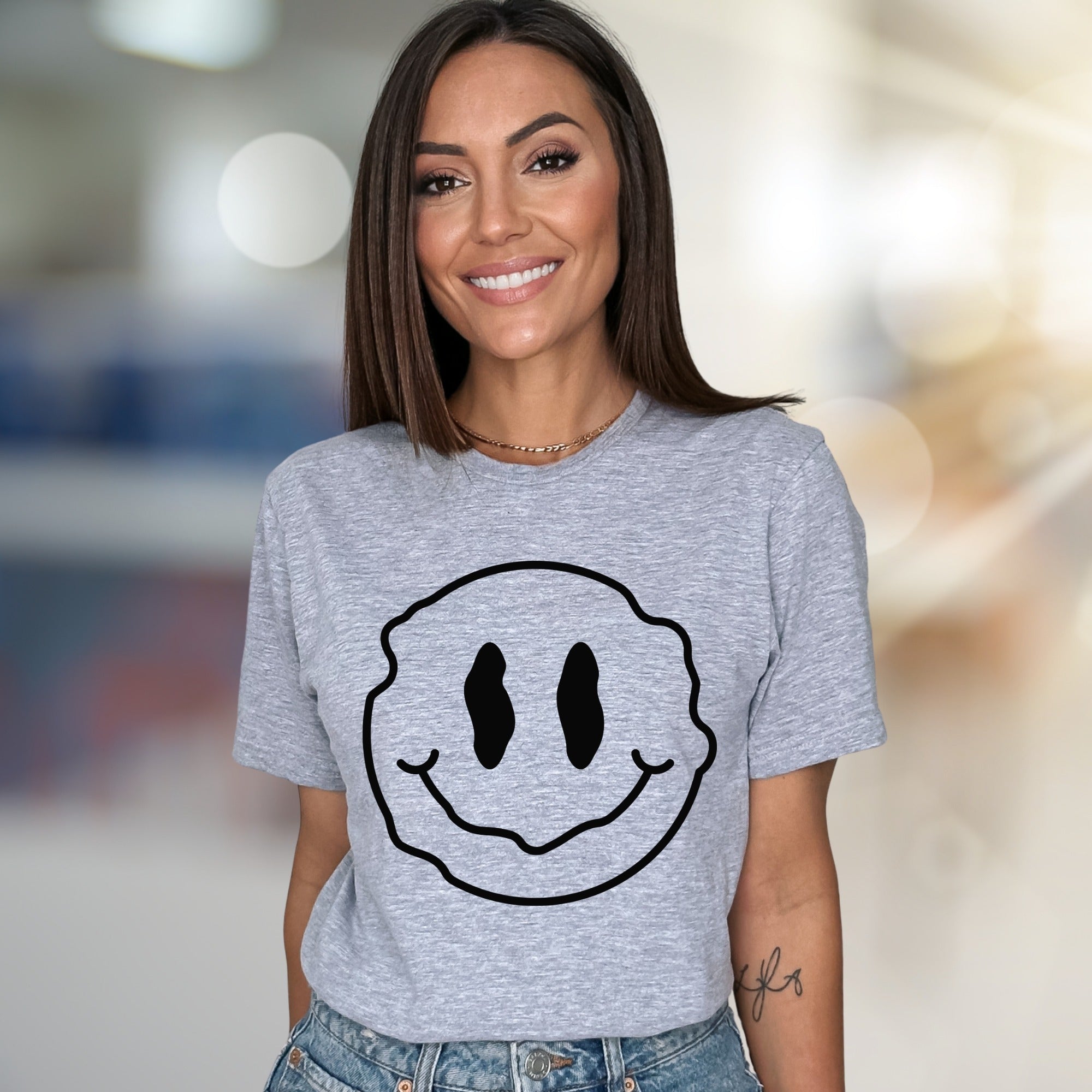 Wavy Melting Smiley Face Graphic Tee, a Trendy Statement for Every Enthusiast