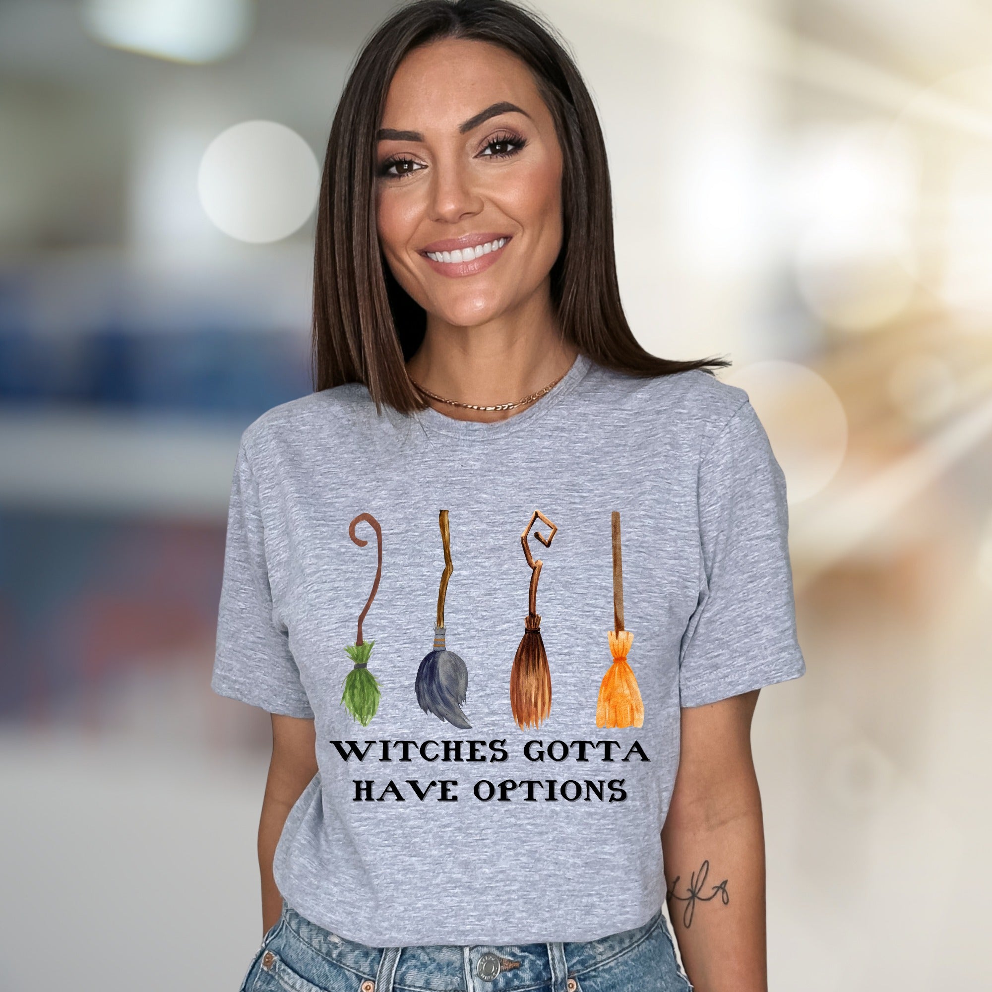 "Witches Gotta Have Options" Halloween Broomstick Graphic Unisex Tee, a Witchy Pick for Spooky Season Enthusiasts