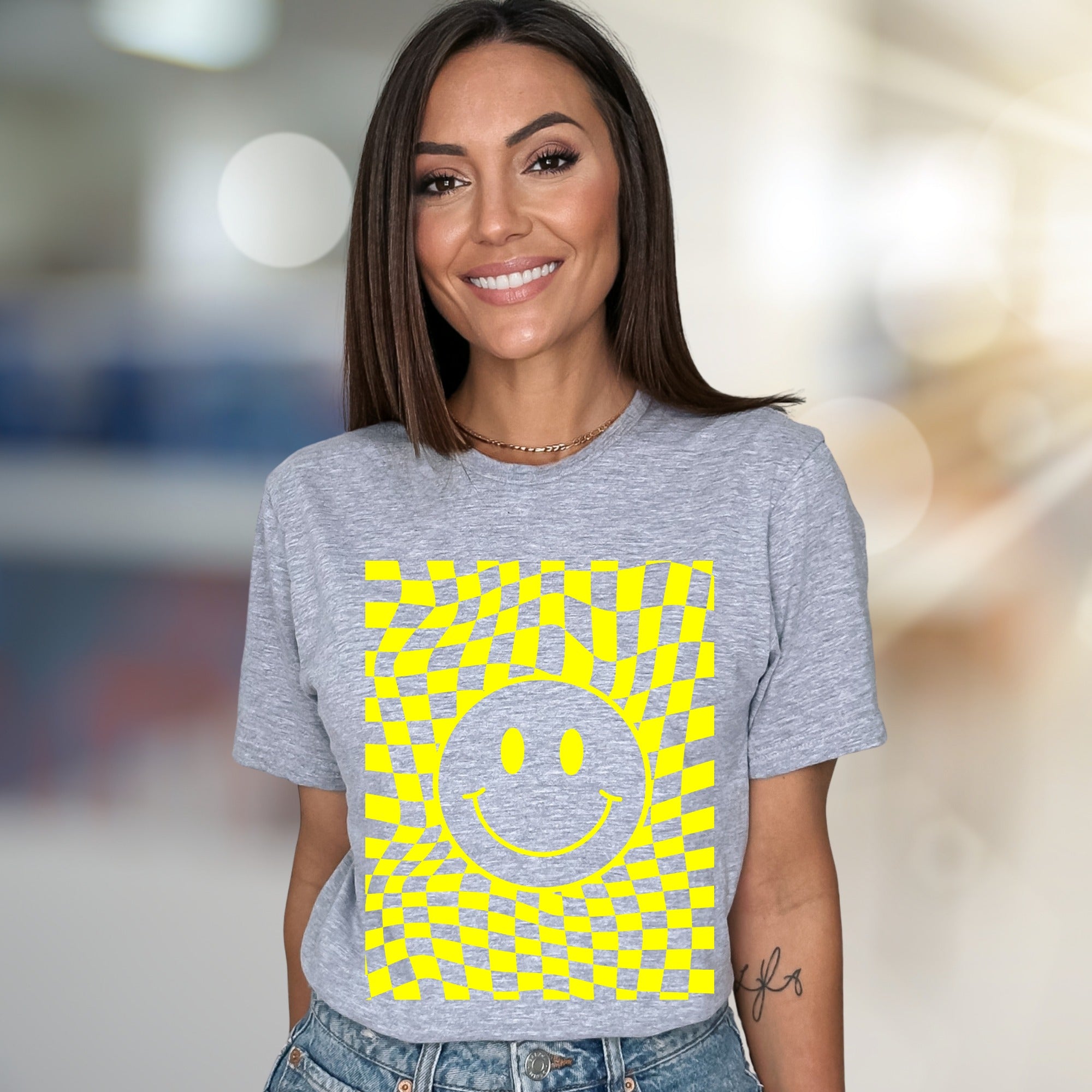 Warped Checkerboard Smiley Graphic Tee, A Retro-Inspired Pick for Free Spirits