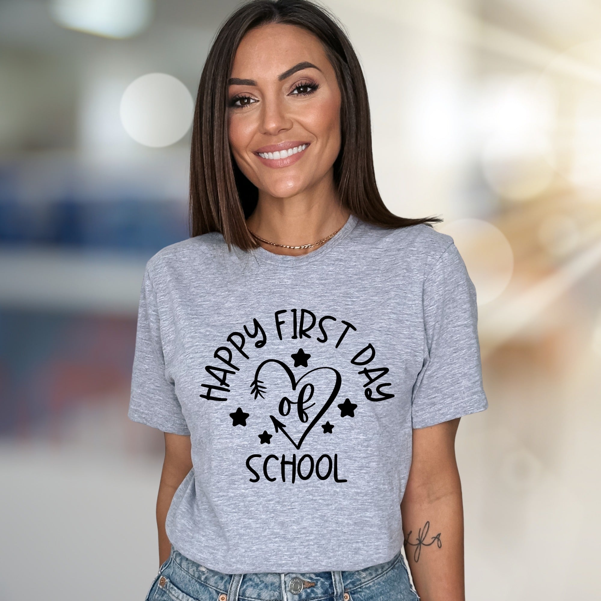 "Happy First Day of School" Heart Graphic Tee, a Back-to-School Pick for Educators & Parents