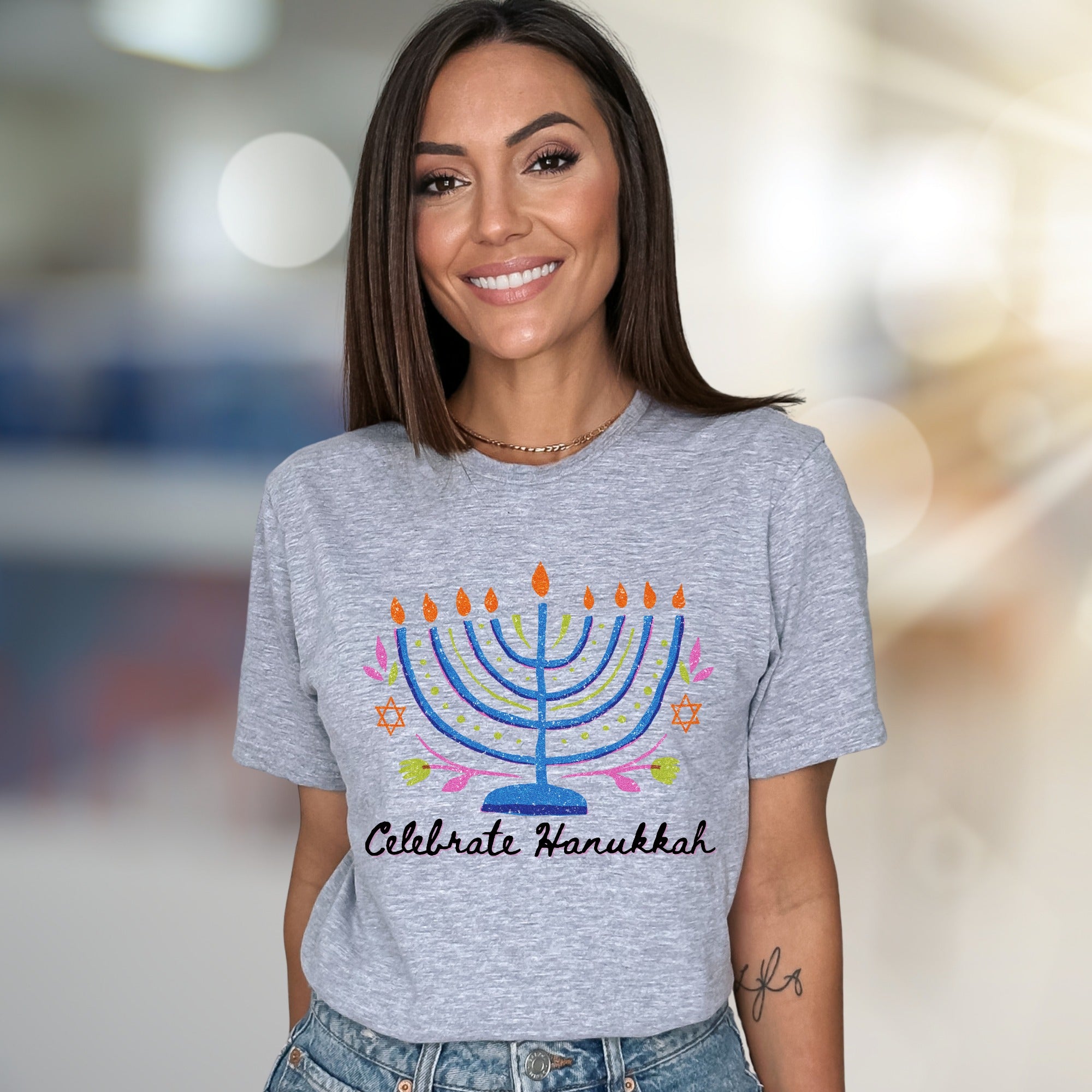 "Celebrate Hanukkah" Vibrant Menorah Graphic Tee, a Festive Holiday Pick for Enthusiasts