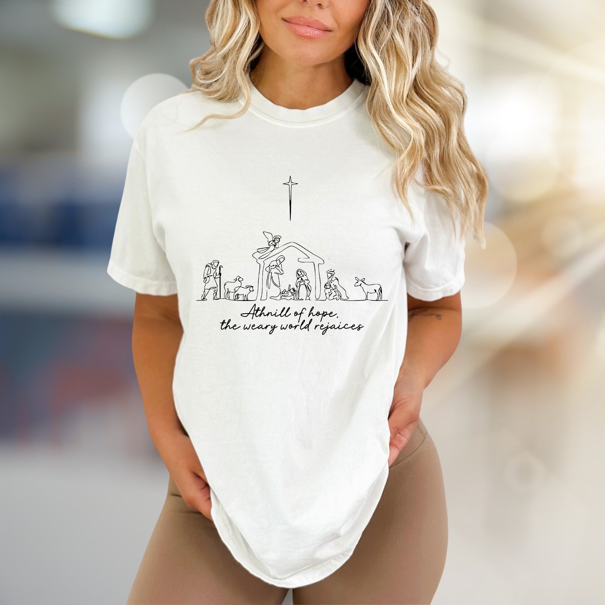 "A thrill of hope, the weary world rejoices" Nativity Scene Graphic Tee, a Holiday Pick for Believers