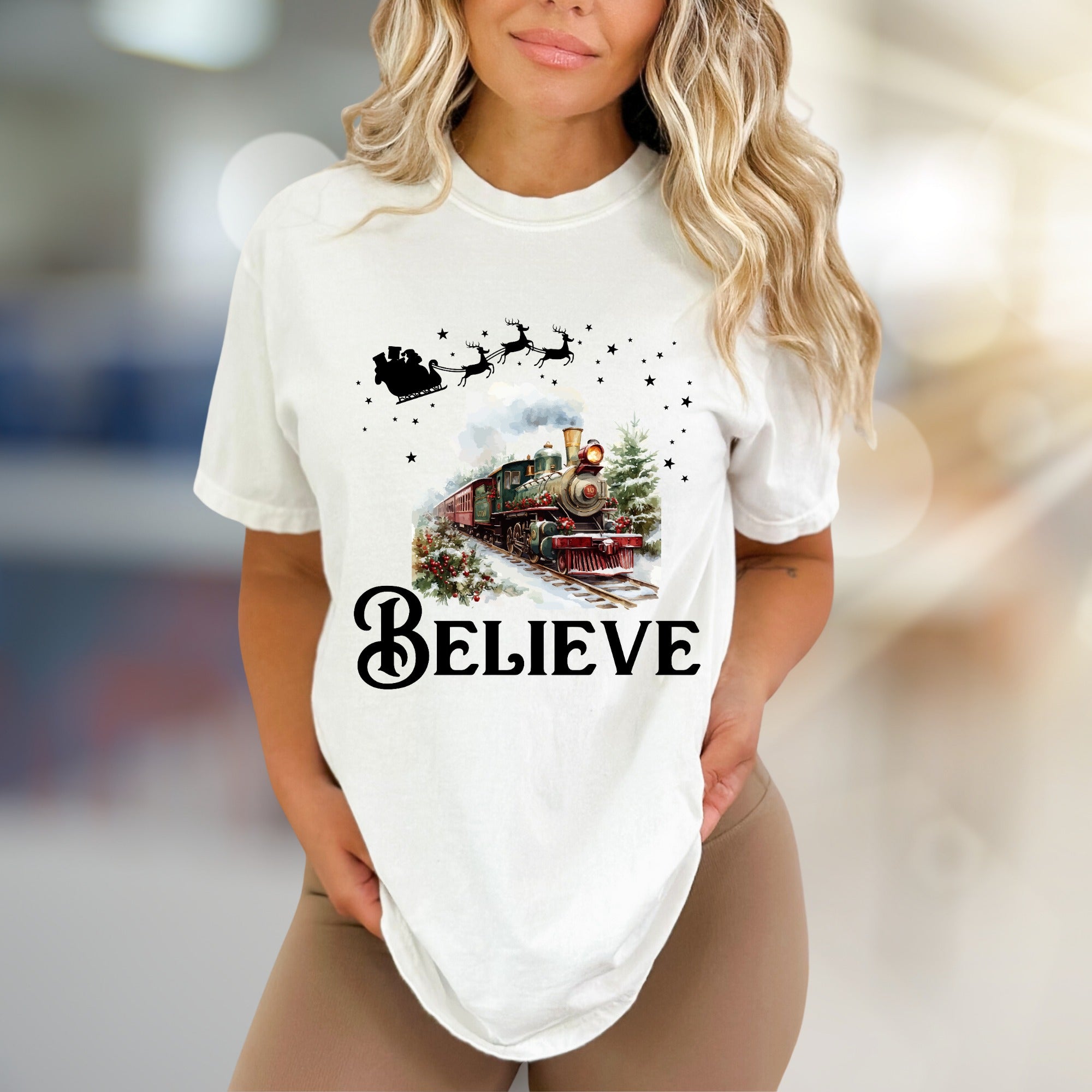 "BELIEVE" Christmas Train Graphic Tee, a Winter Wonderland Pick for Holiday Enthusiasts