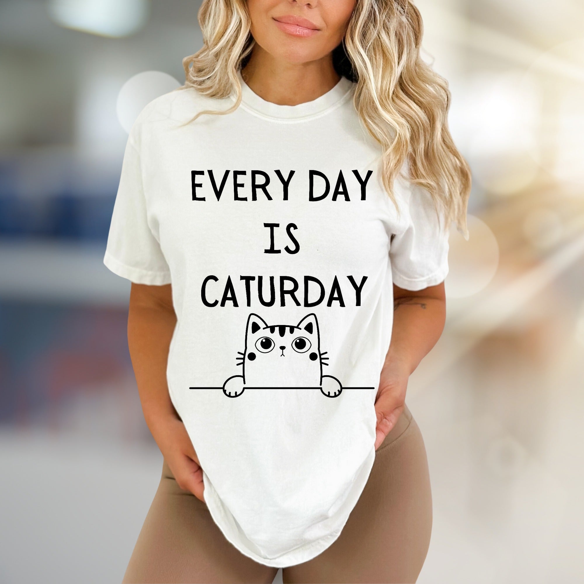 "EVERY DAY IS CATURDAY" Whimsical Cat Graphic Tee, a Feline Fun Pick for Pet Lovers