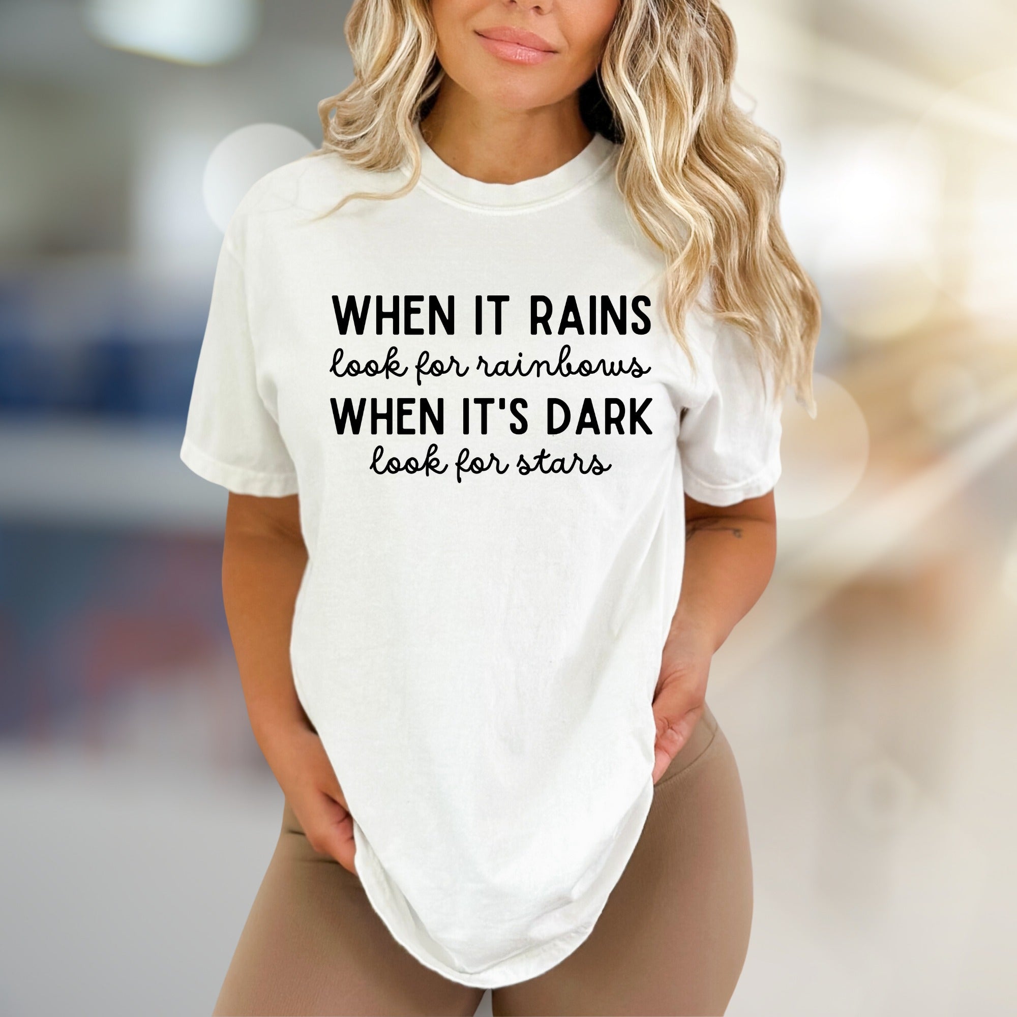 "WHEN IT RAINS look for rainbows" Inspirational Quote Graphic Tee, a Positive Vibe Pick for Optimists