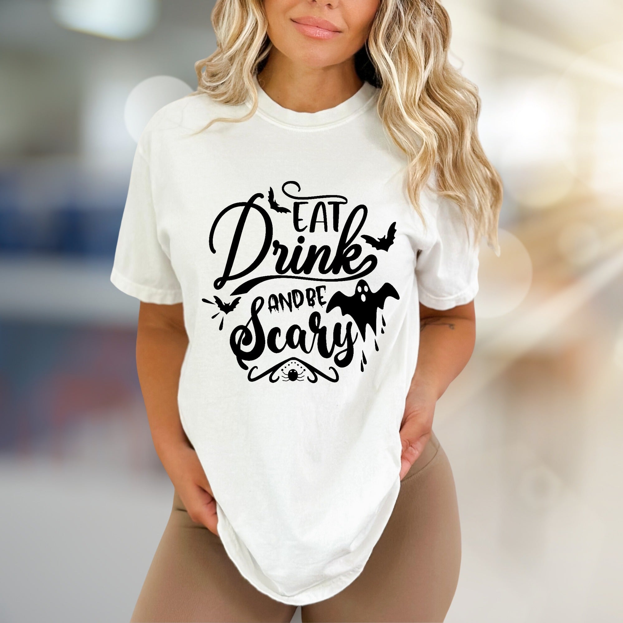 "Eat Drink And Be Scary" Halloween Graphic Tee, a Spooky Chic Pick for Partygoers