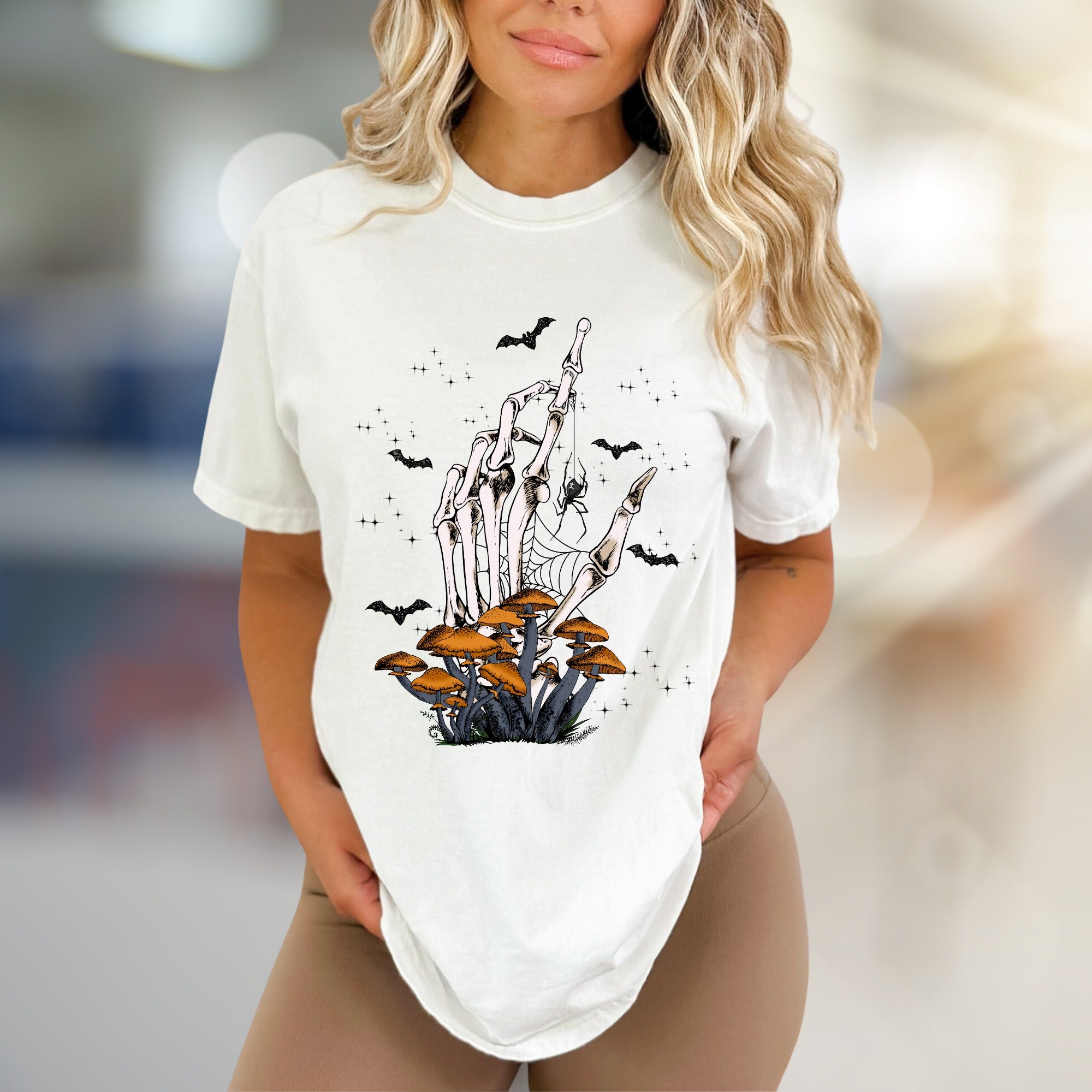 Skeleton Hand Mushroom Graphic Tee, a Spooky-Cute Pick for Halloween Lovers
